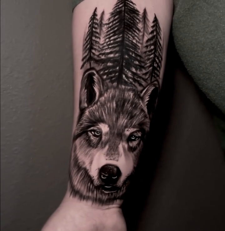 Wolf in forest realism tattoo by Jacob Martin, Toledo, Ohio