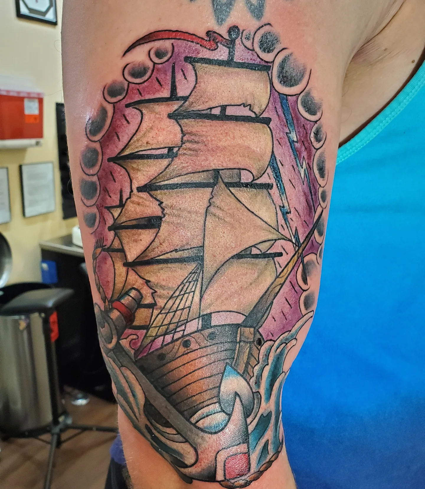 Ship and octopus American traditional tattoo on the forearm by Ginny McCormick, Richmond, Virginia