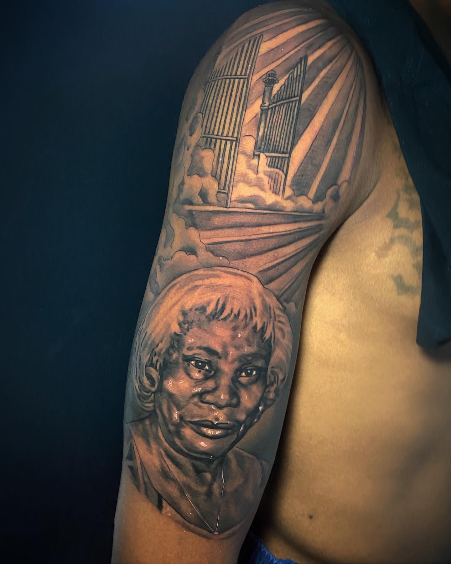 Portrait of elderly woman realism tattoo on the shoulder by "CAM", West Palm Beach, Florida