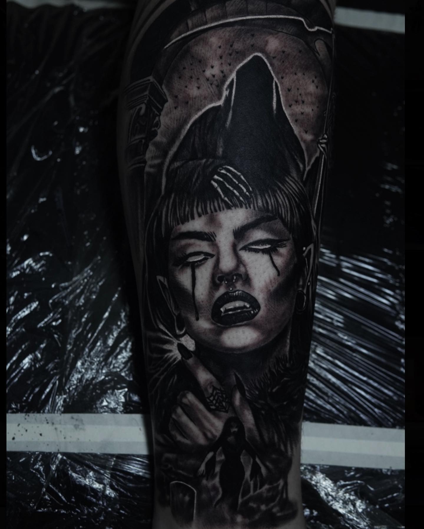Woman with tears dark realism tattoo on the forearm by Brian Cassidy