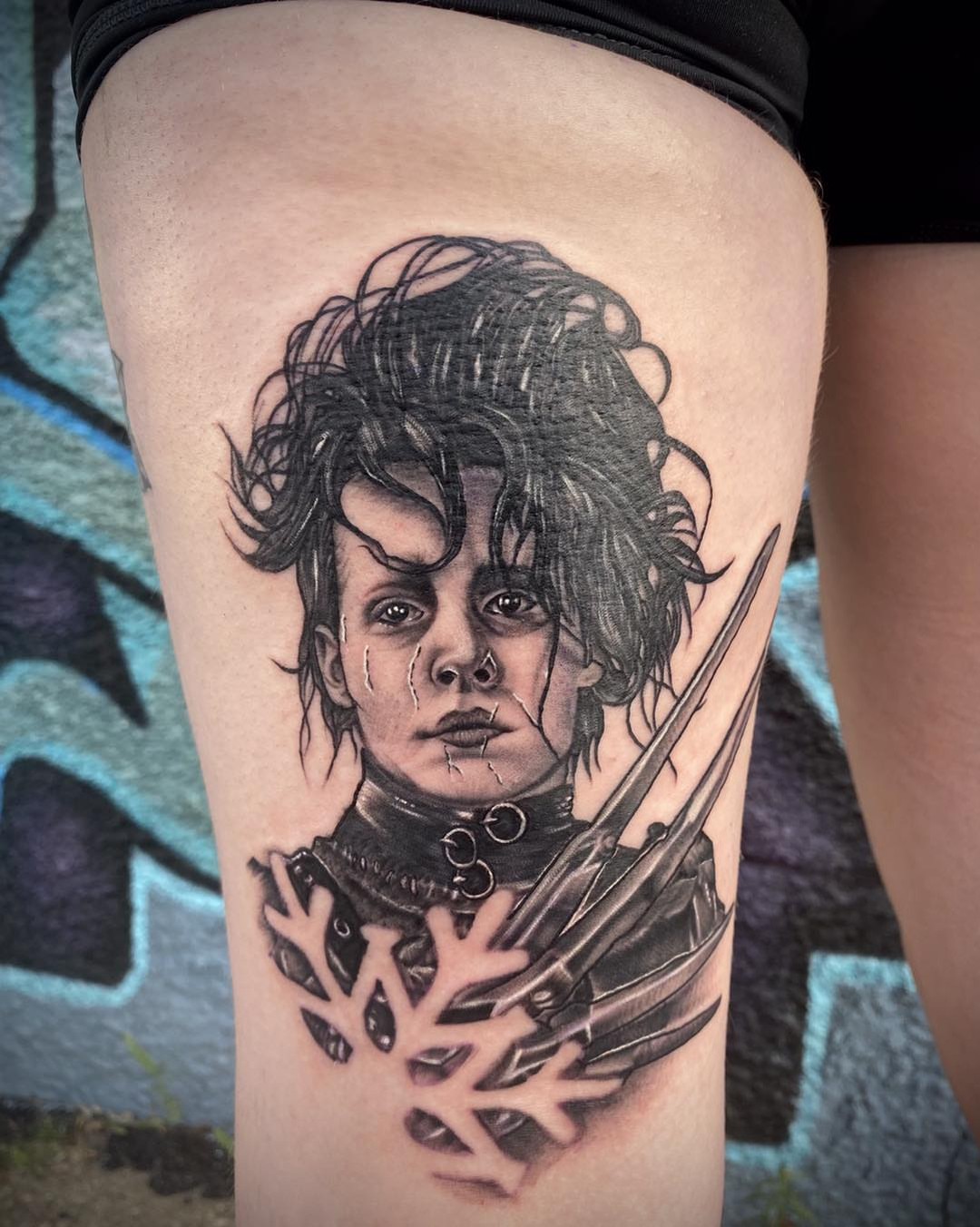 Edward Scissorhands realism tattoo on the thigh by Shelly Elissa Tattoos