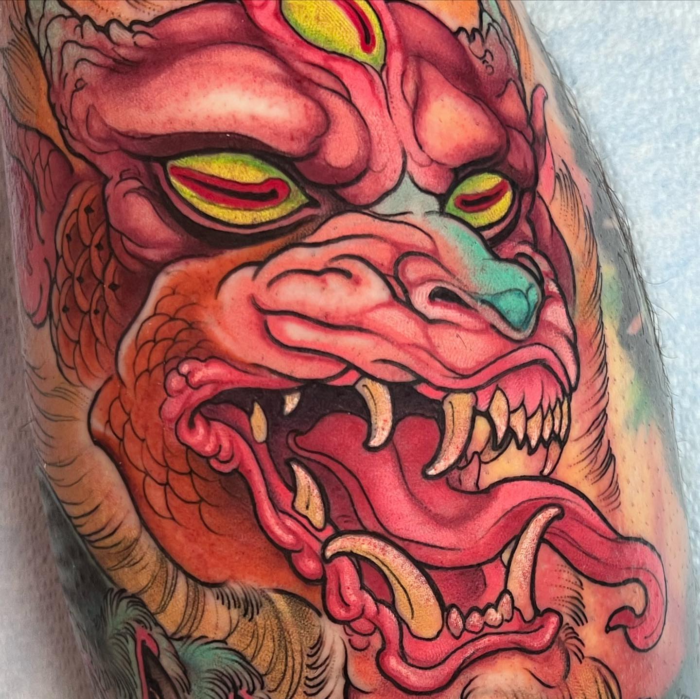 Demon head American traditional tattoo on the forearm by Alisha Harding