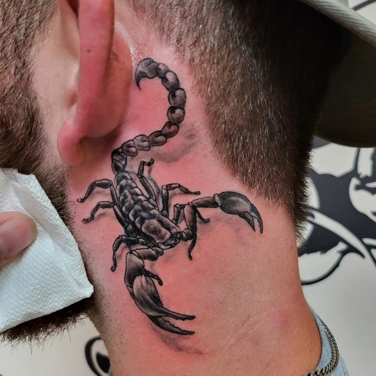 Scorpion black and grey tattoo on the neck by Mike Stamper