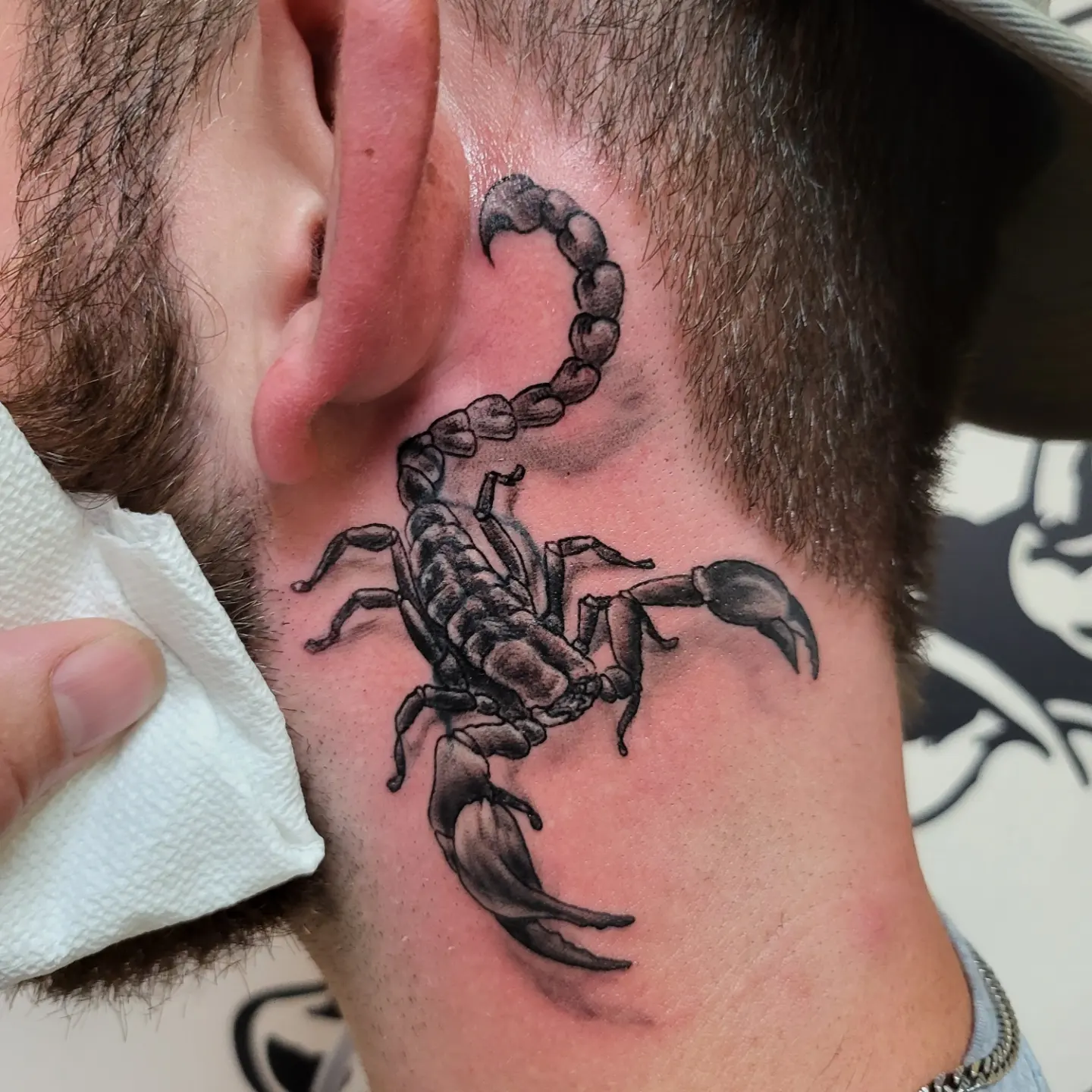 Scorpion black and grey tattoo on the neck by Mike Stamper