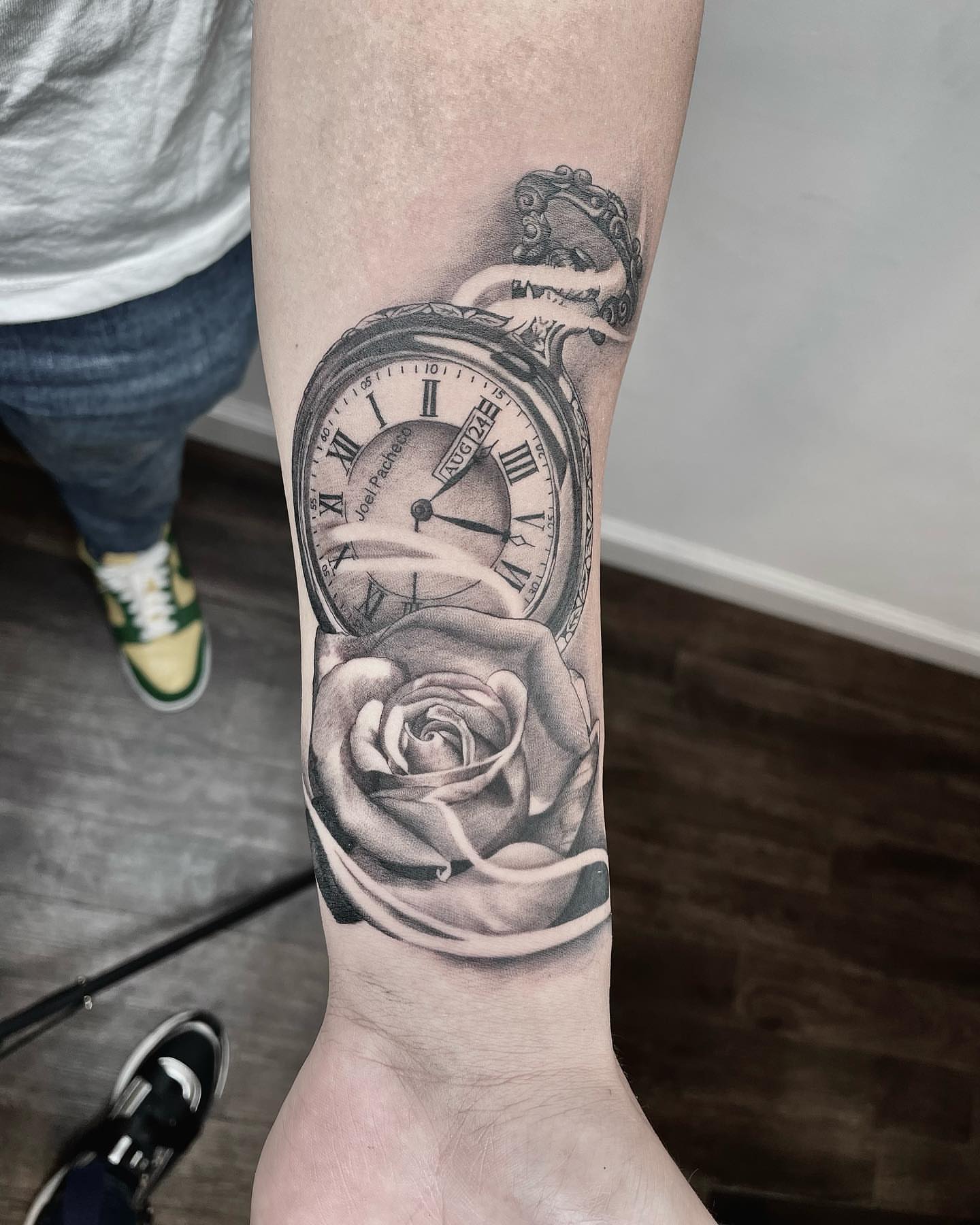 Clock and rose realism tattoo on the forearm by DJ ๐จ๐พโ๐จ
