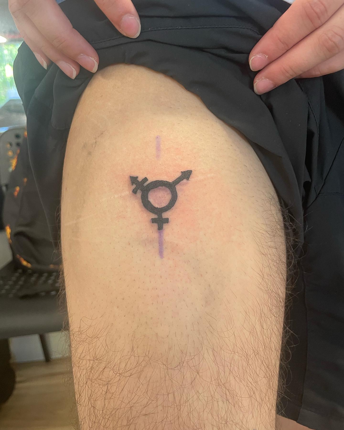 Gender symbol geometric tattoo on the thigh by Al