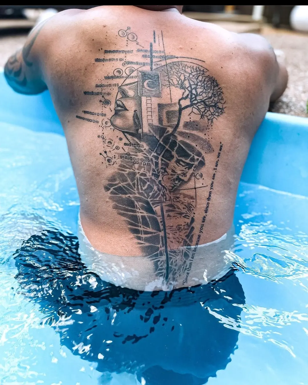 Abstract art dotwork tattoo on the back by BoogaInk