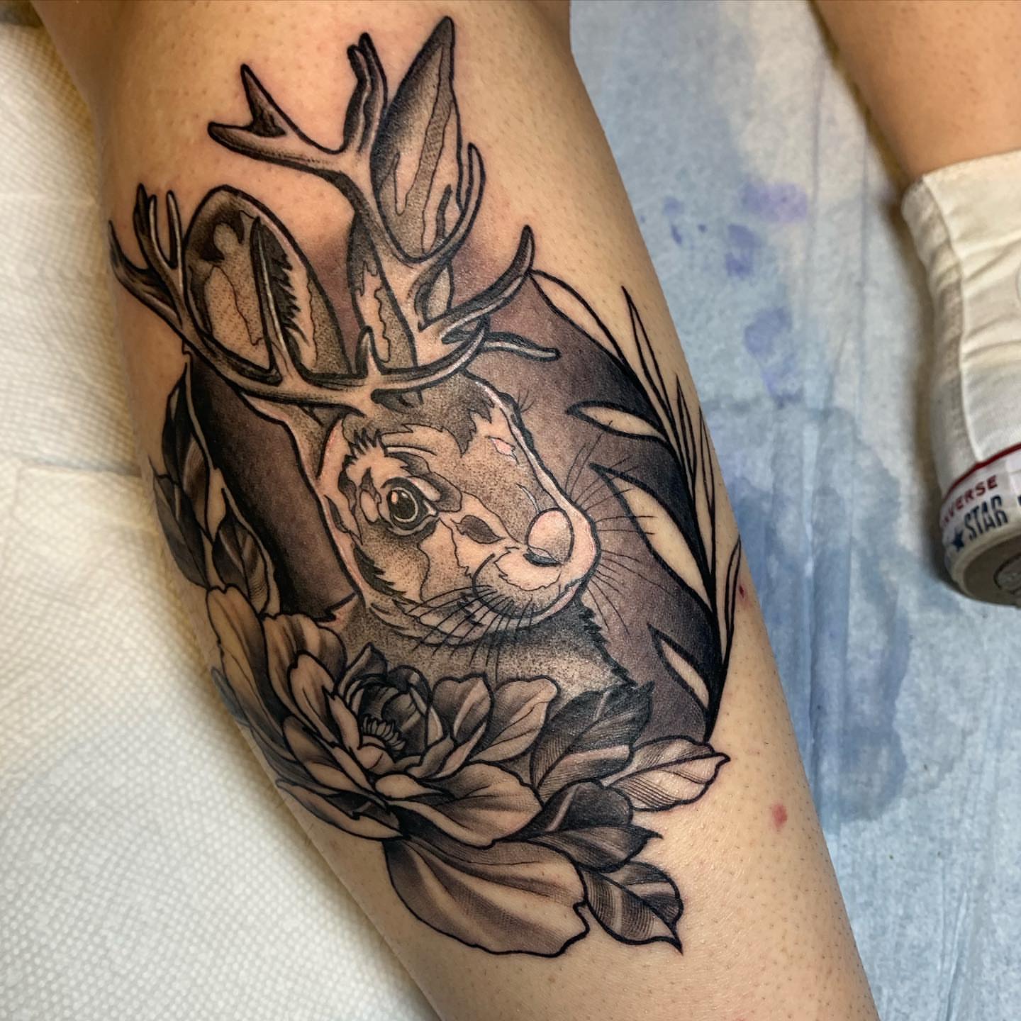 Deer and rabbit realism tattoo on the forearm by ATLANTA Queer Tattooer
