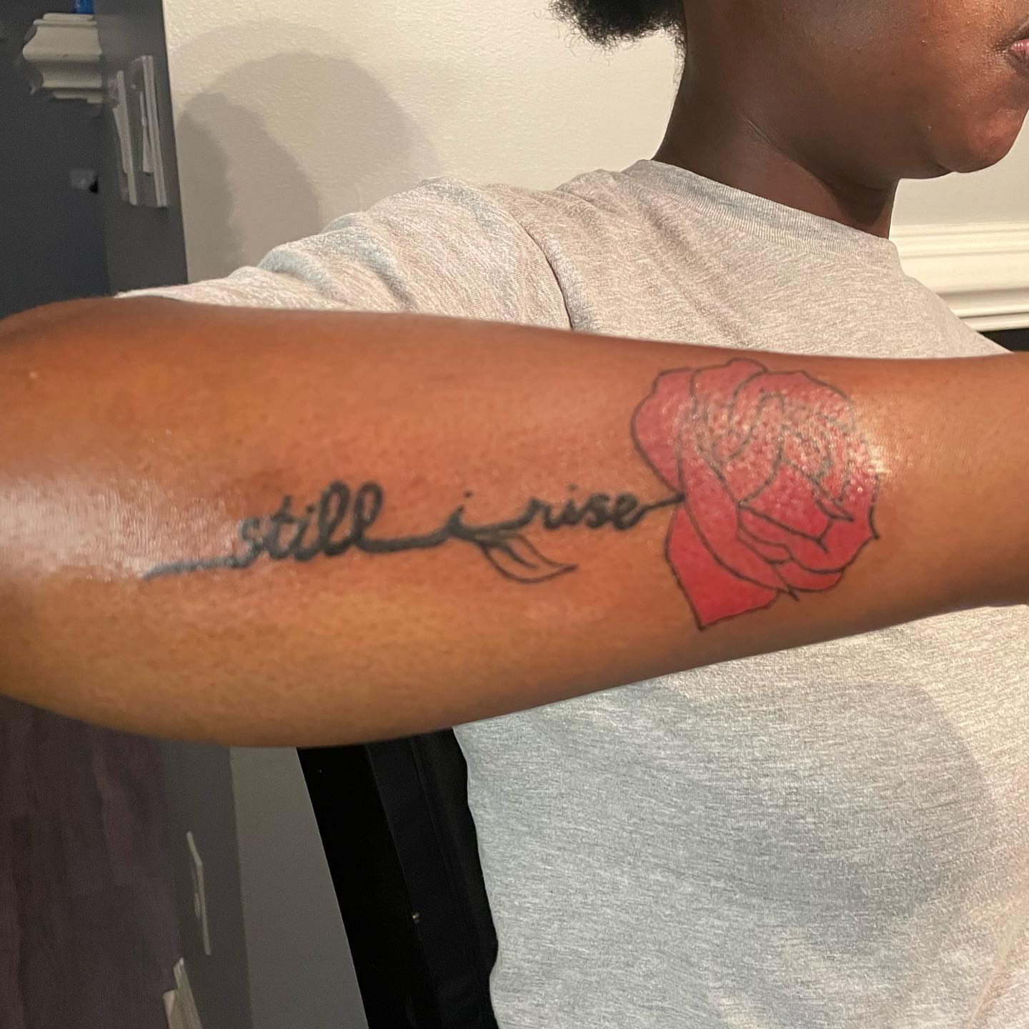 Still i rise lettering script tattoo on the forearm by Lea-yae’