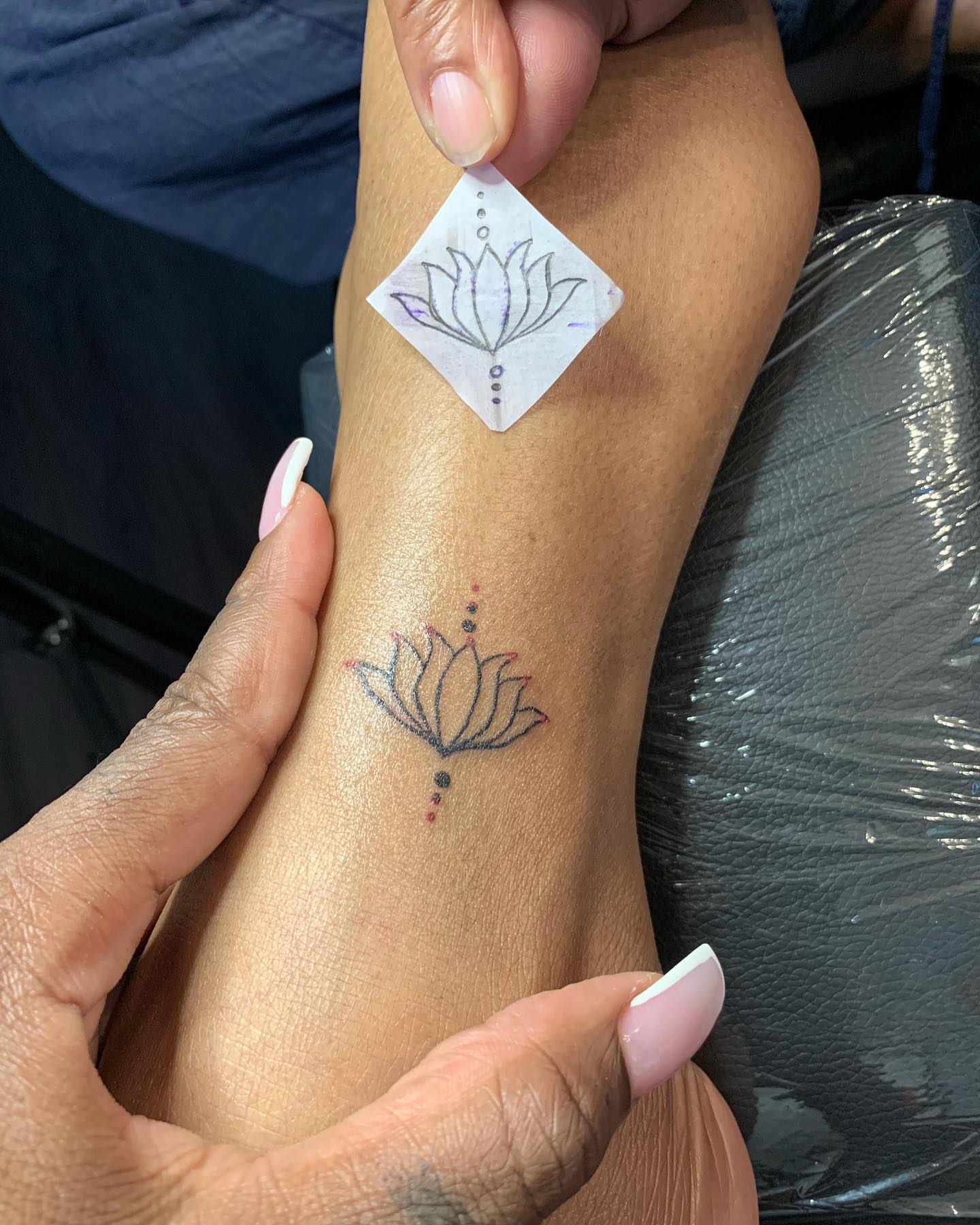 Lotus flower dotwork tattoo on the forearm by Lea-yae’