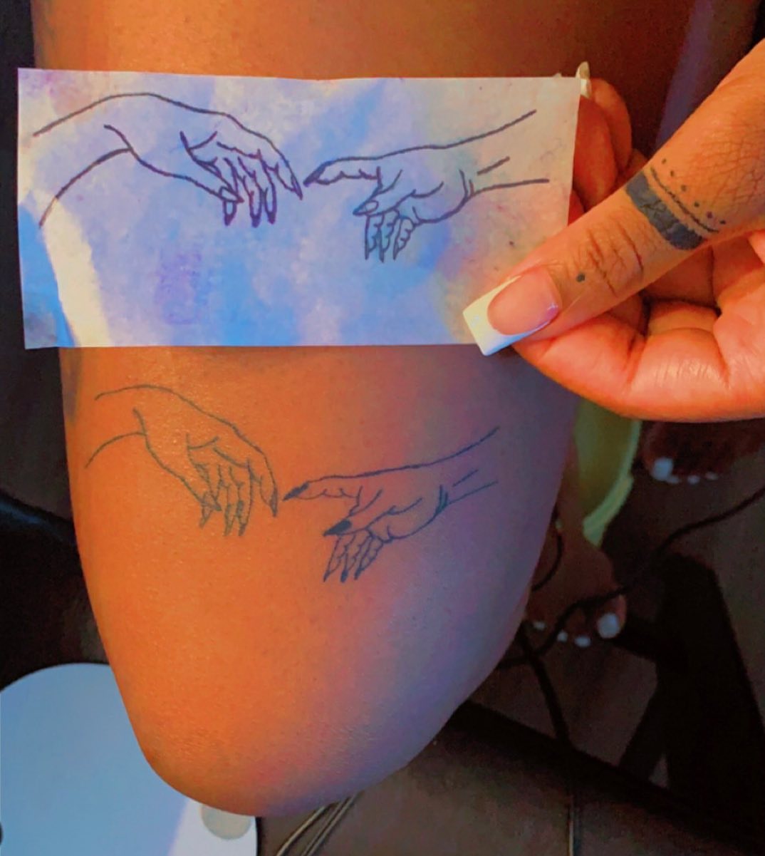 Hands fine line tattoo on the thigh by Lea-yae’