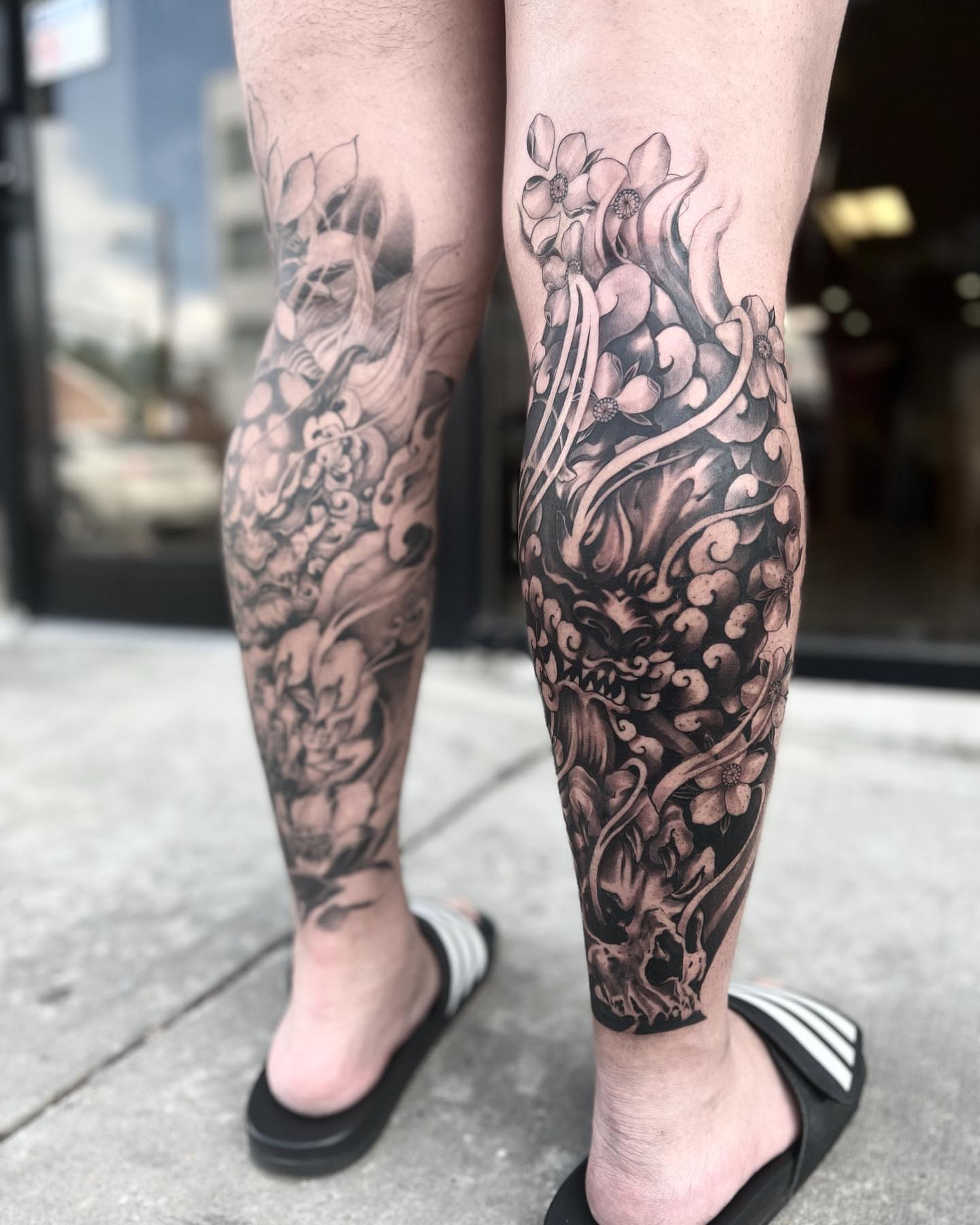 Dragon and flowers japanese irezumi tattoo on the calf by Jennal Wang