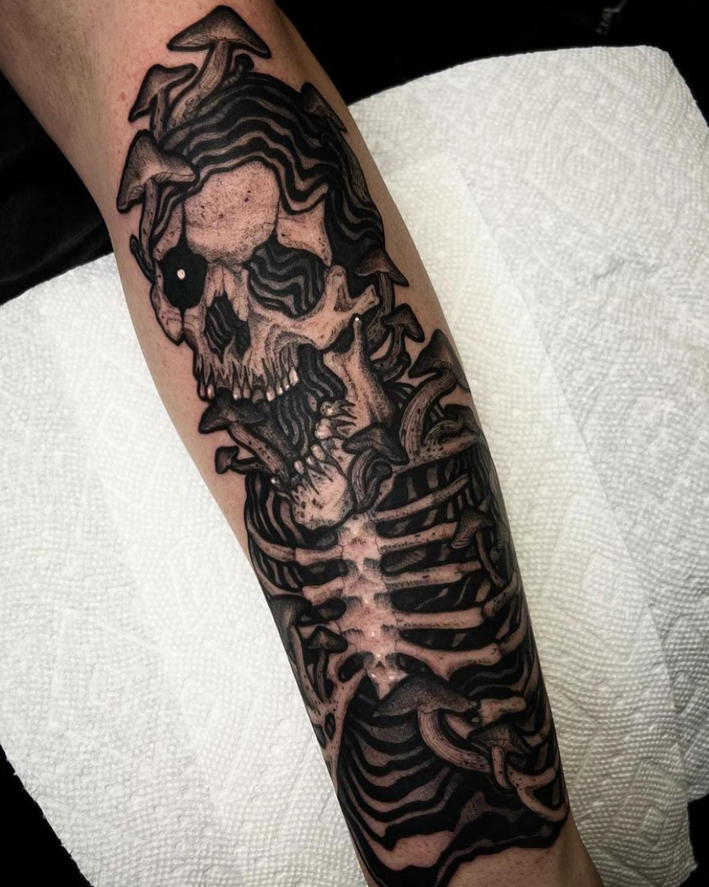 Skull and ribcage realism tattoo on the forearm by Kyle Black