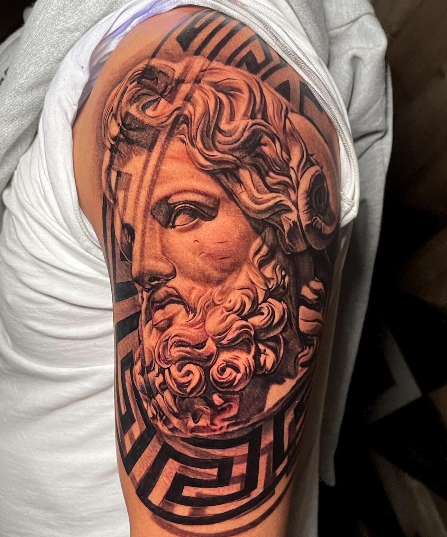 God-like figure realism tattoo on the shoulder by Christian Medina, Sacramento, California