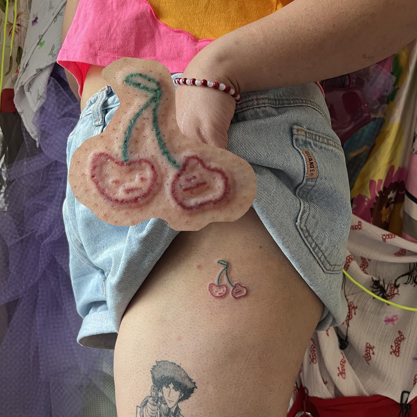 Cherry dotwork tattoo on the thigh by mars