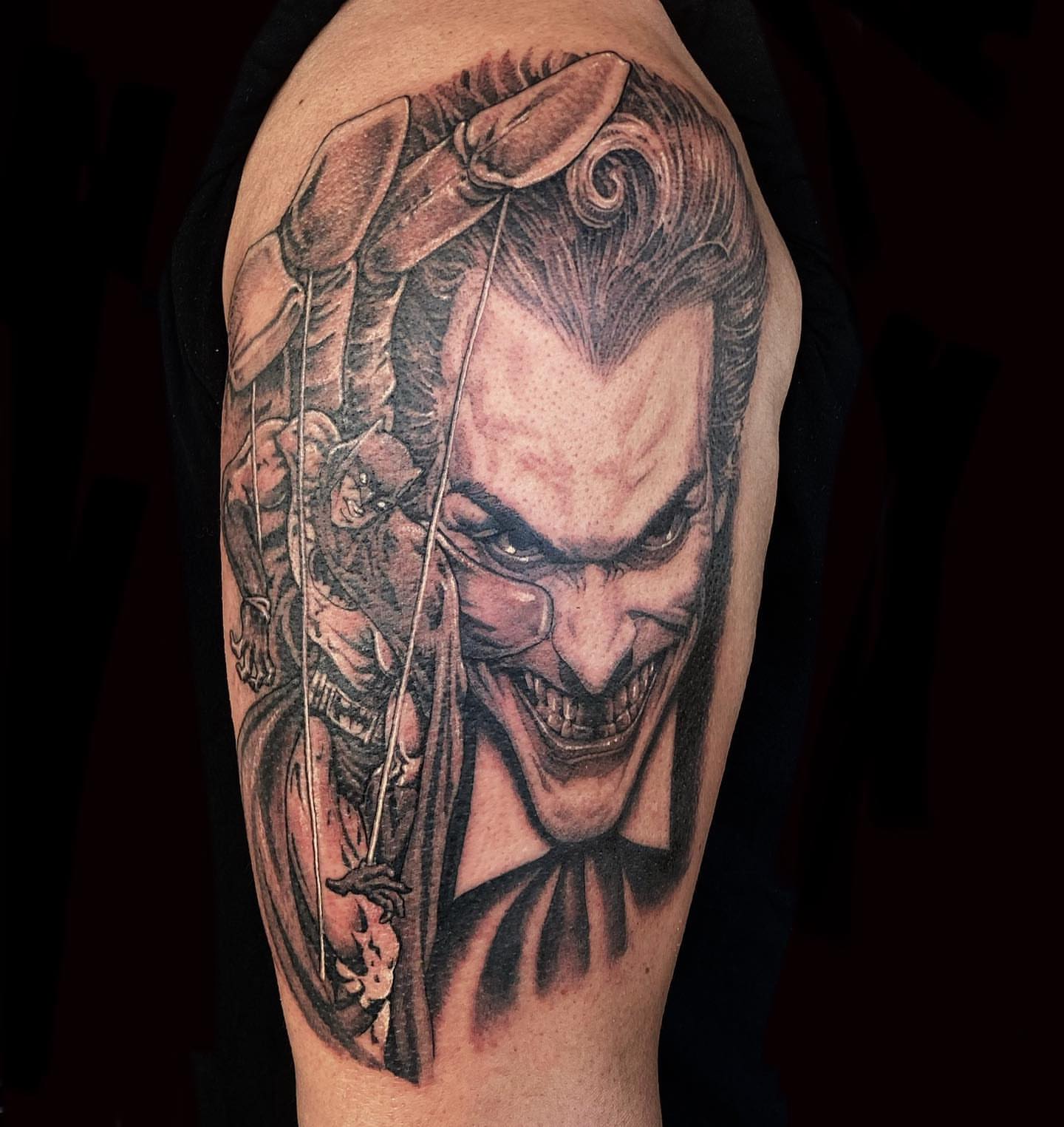 Joker dark realism tattoo on the forearm by Justin Hendrick
