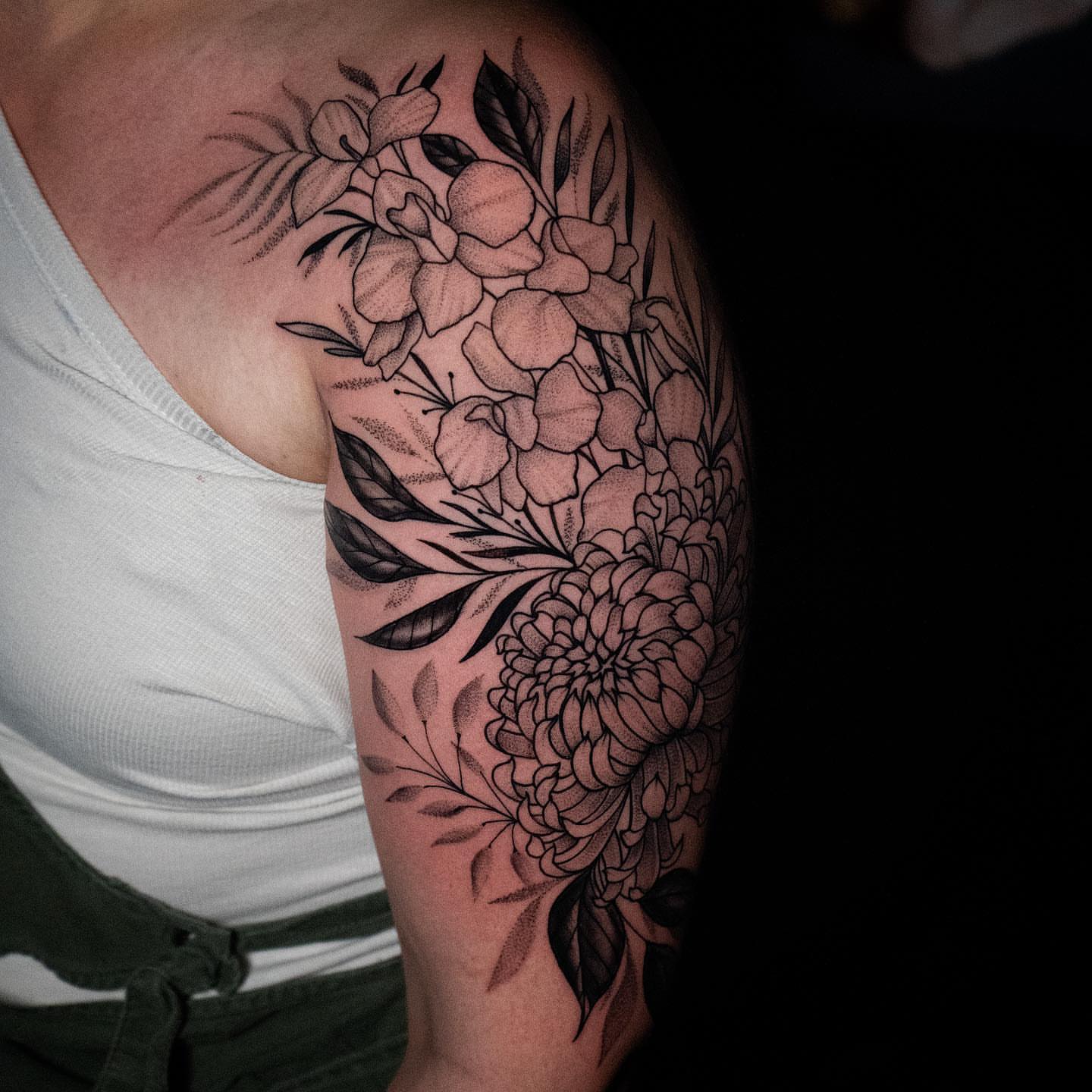 Floral bouquet dotwork tattoo on the forearm by all gas no brakes! no days off!