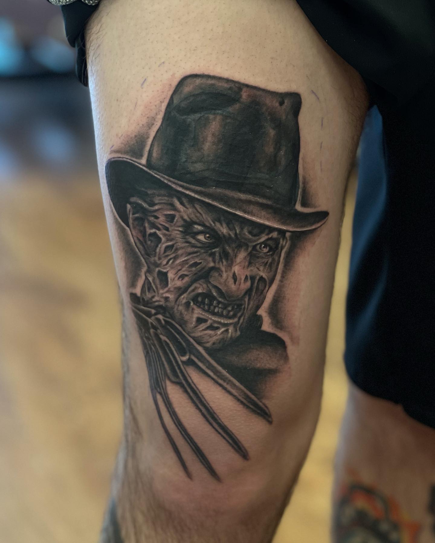Freddy Krueger realism tattoo on the thigh by Elaine Nerowski ☾