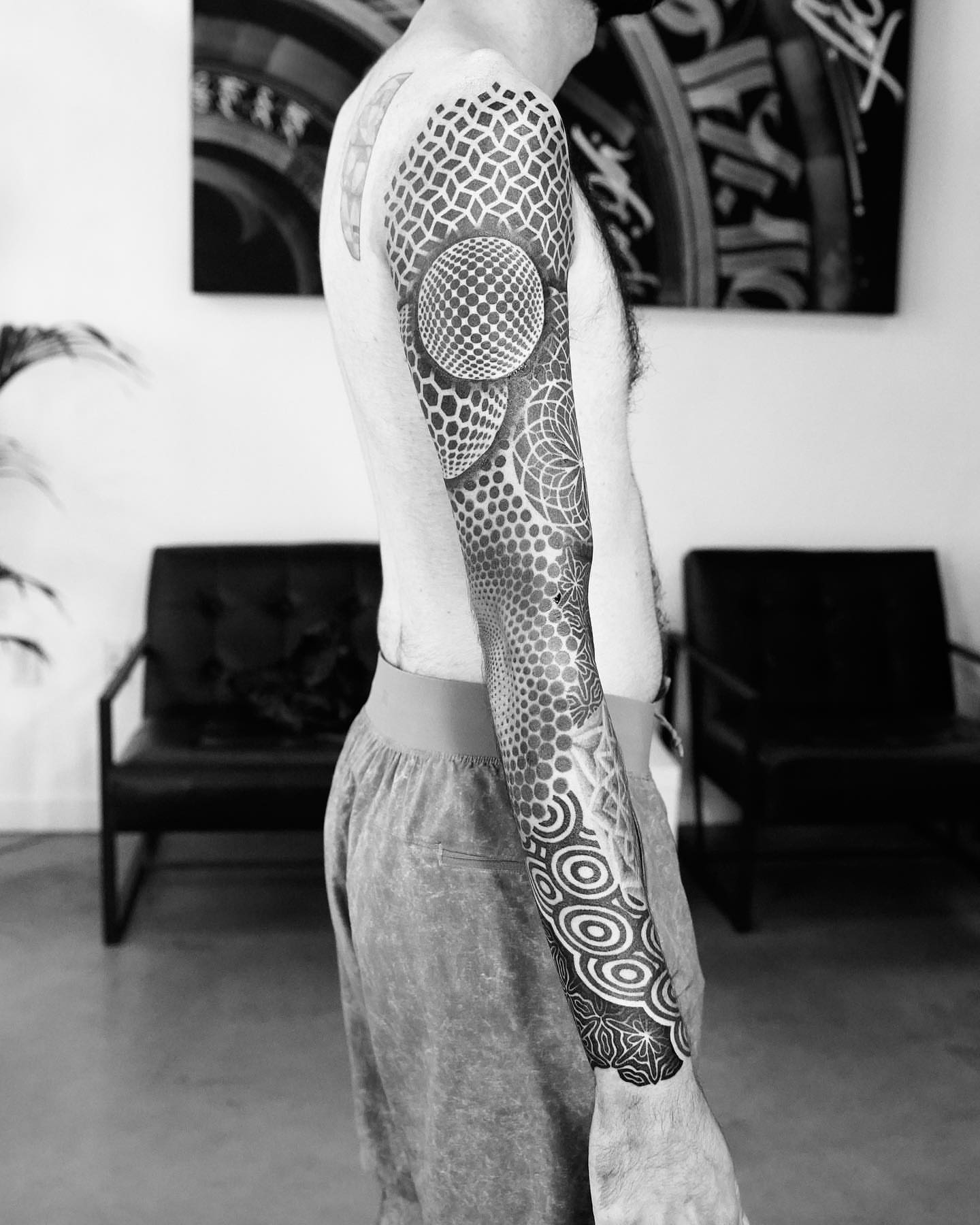 Tattoo by @rjxdots — dotwork, geometric