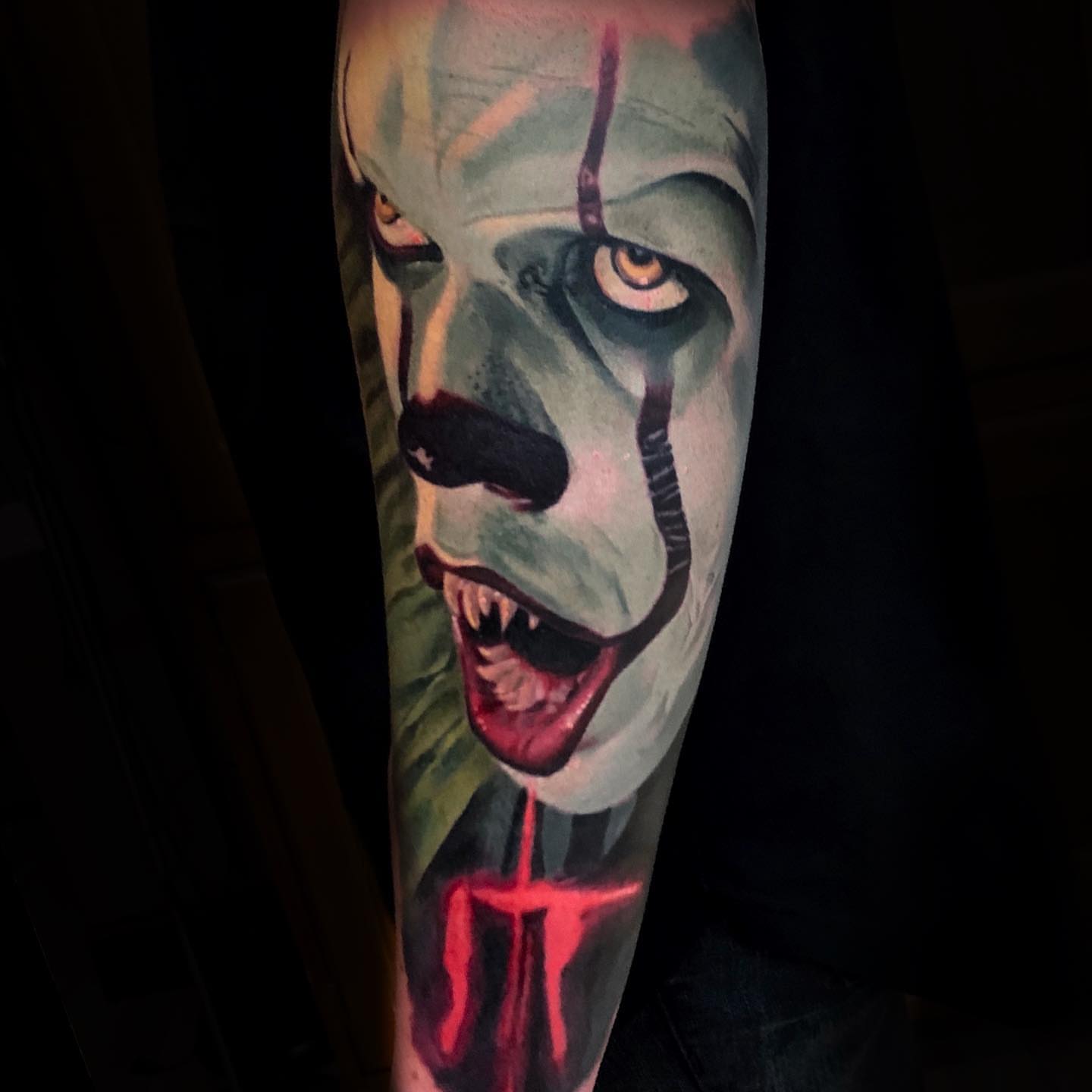 Clown realism tattoo on the forearm by Robert Morton, Cleveland, Ohio