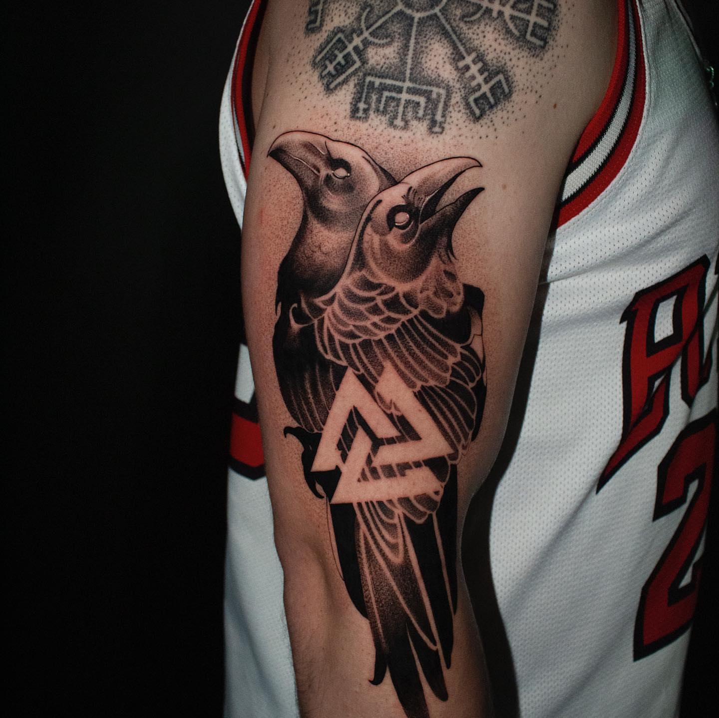 Ravens geometric tattoo on the forearm by Nikita Grinenko, San Francisco
