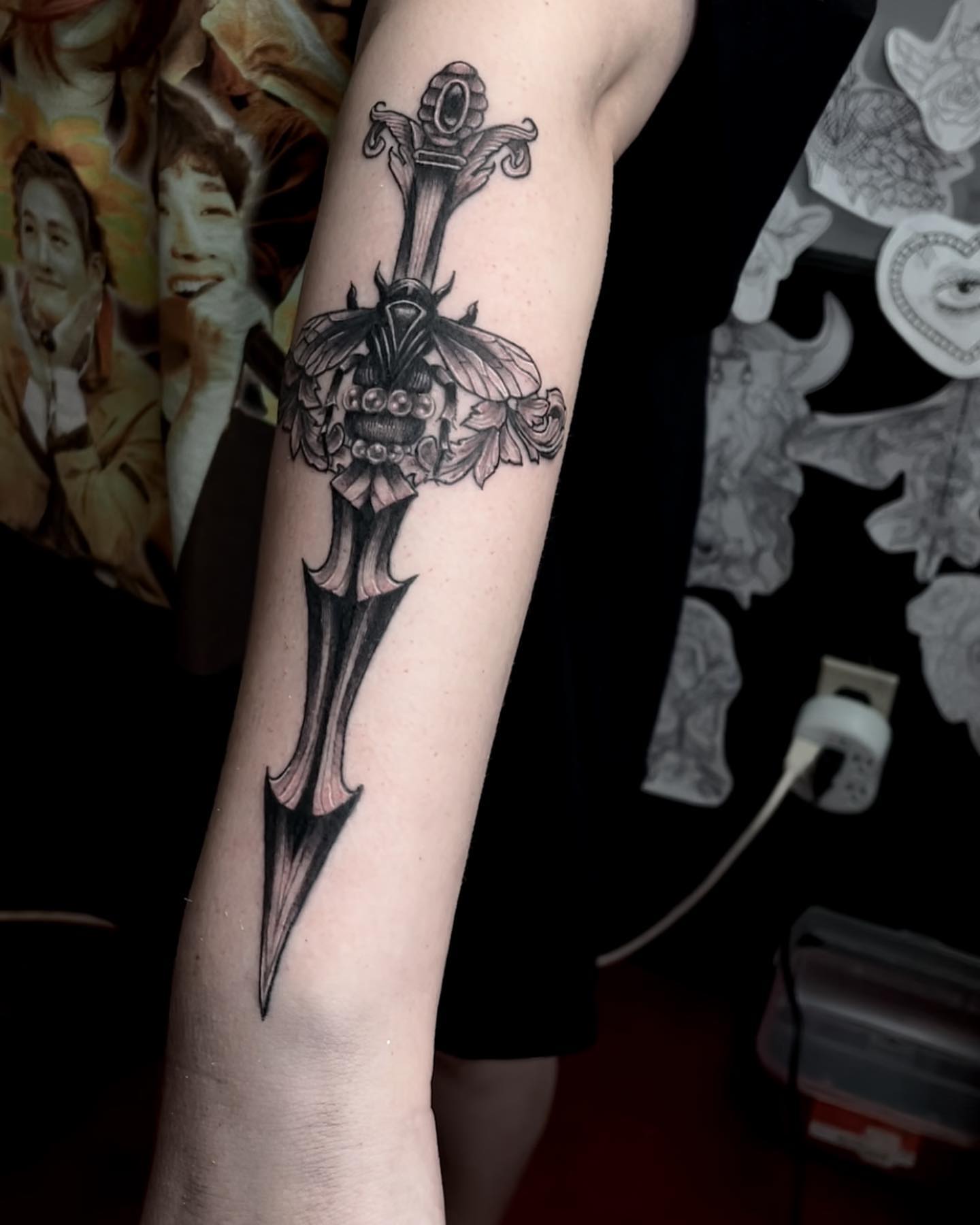 Sword black and grey tattoo on the forearm by Myla Jane, Houston, Texas