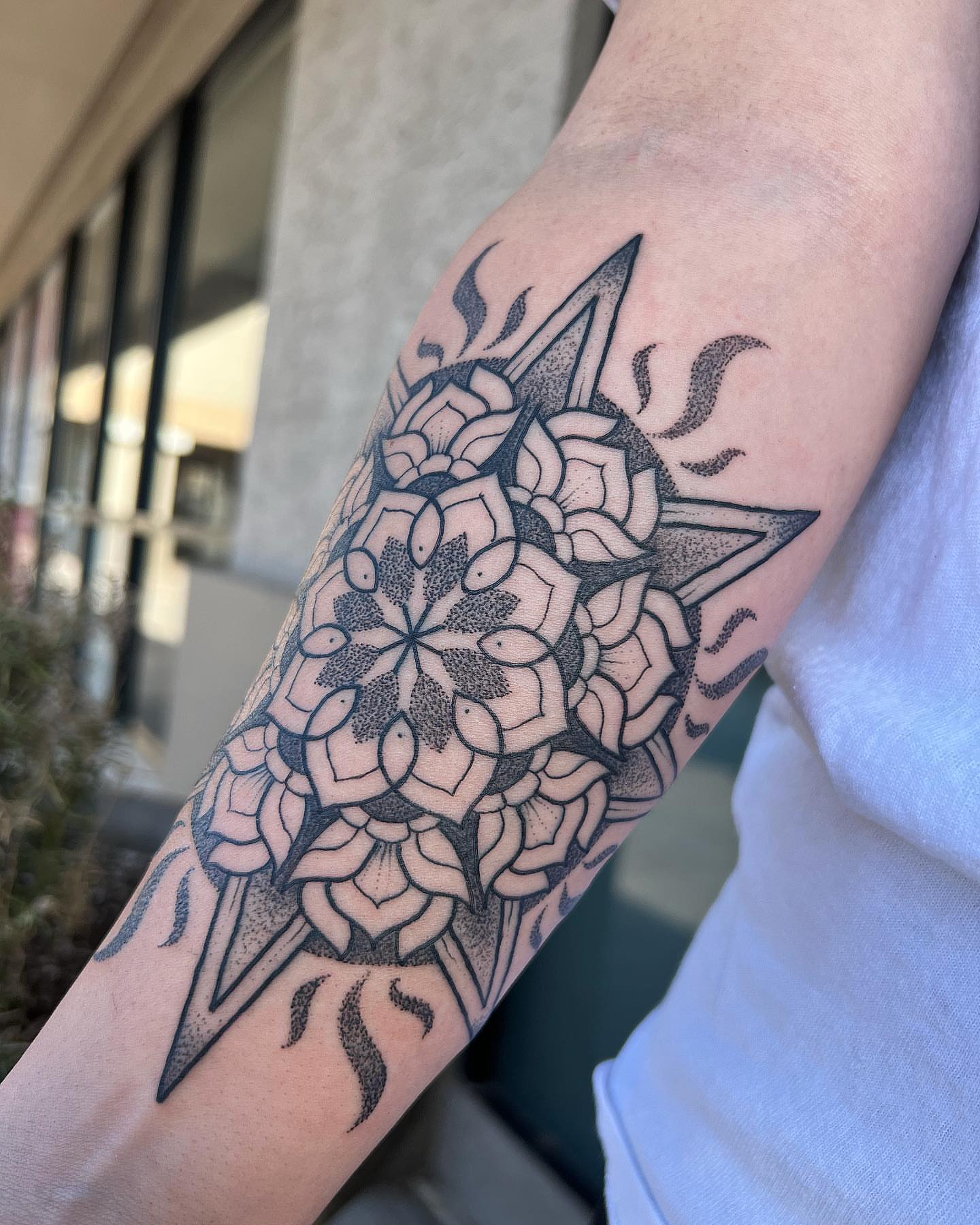 Floral mandala dotwork tattoo on the forearm by Byron Winkelman, Gilbert, Arizona