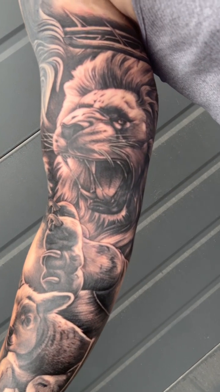 Lion and lamb realism tattoo by Kyle Lopez, Union City, California