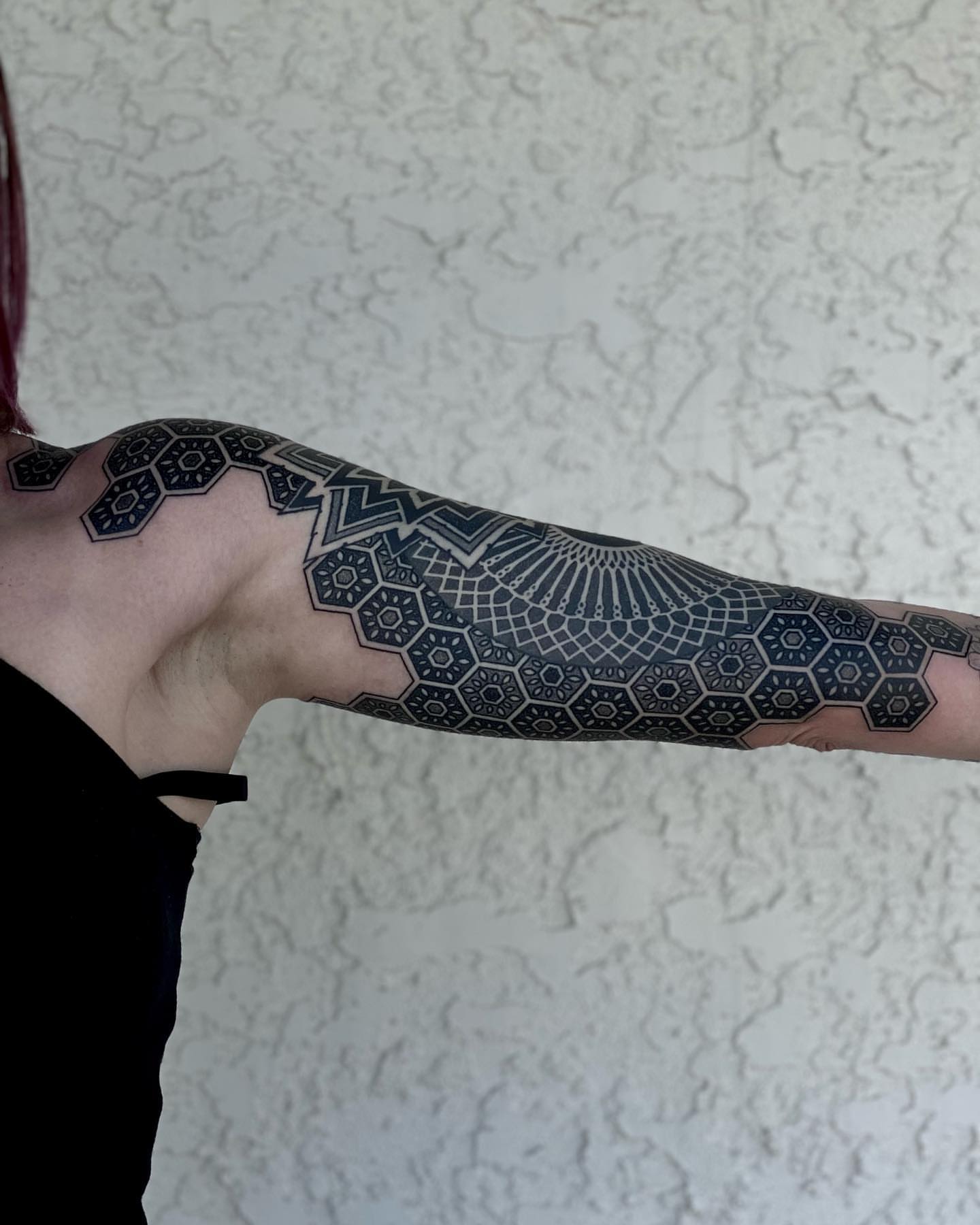 Geometric pattern geometric tattoo on the forearm by Tyler Charles