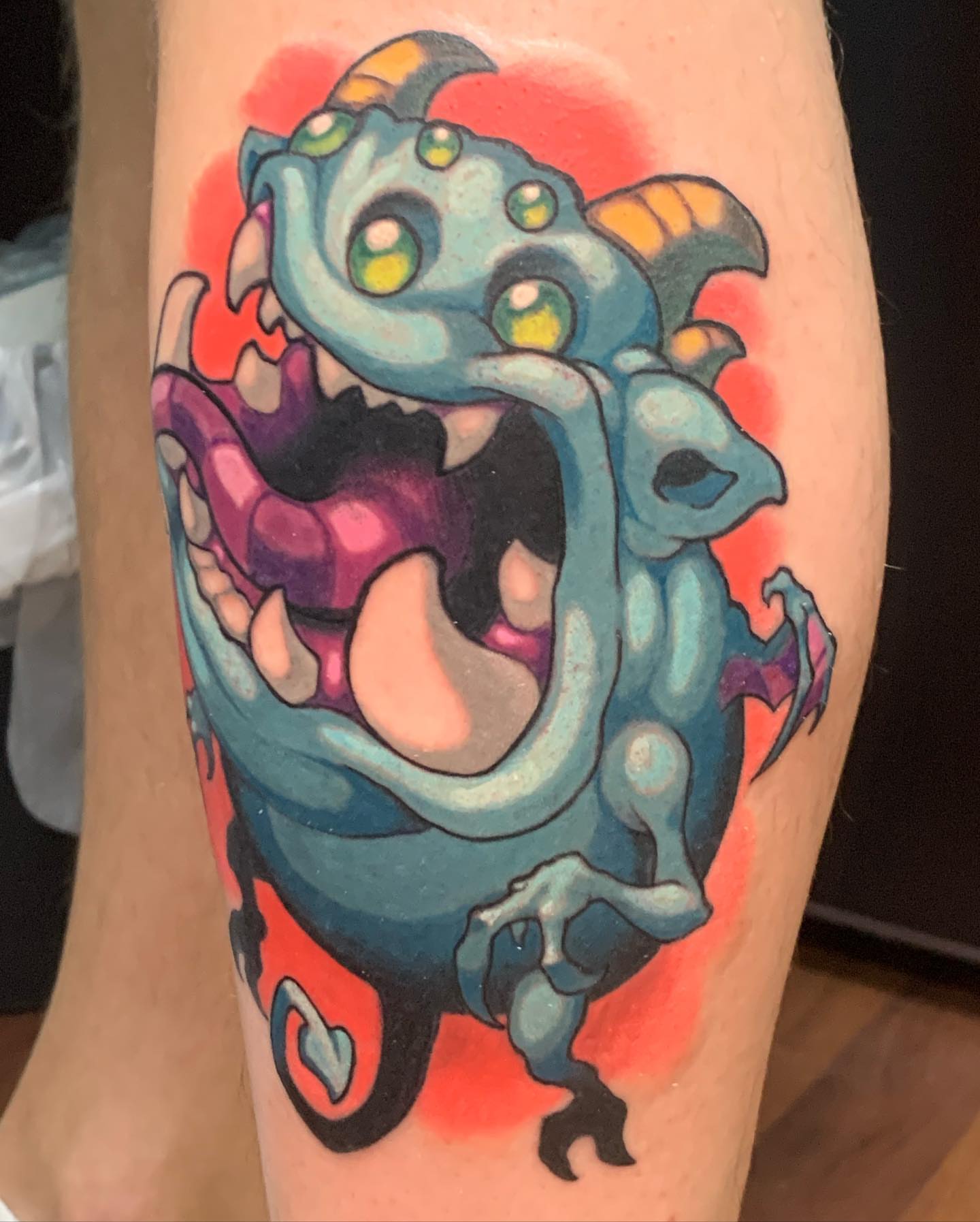 Monster new school tattoo on the forearm by shane baker