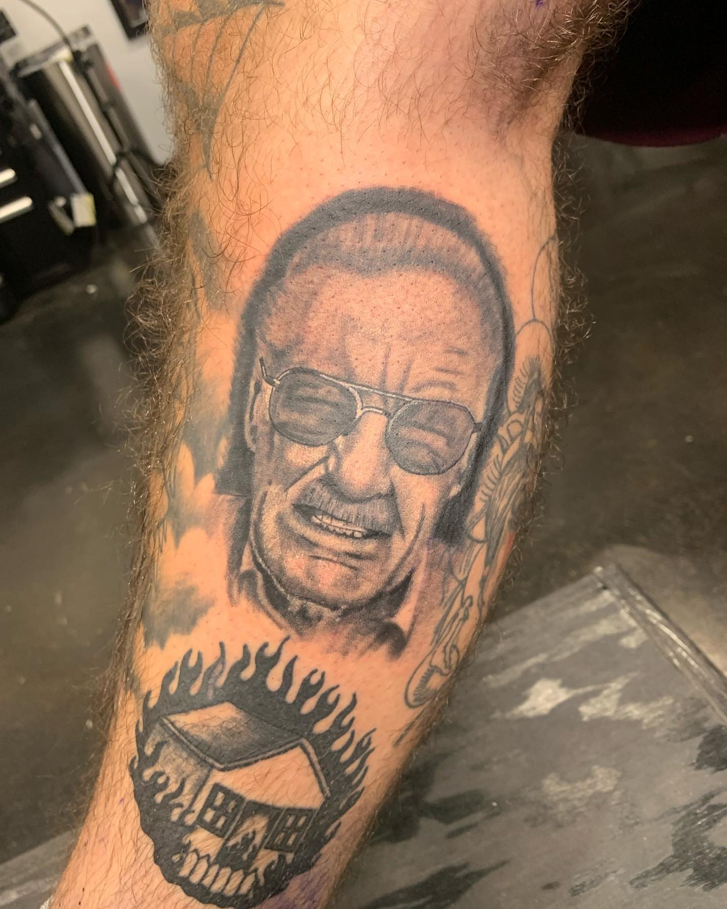 Tattoo by @burkes.body.graphic — realism, black_and_grey