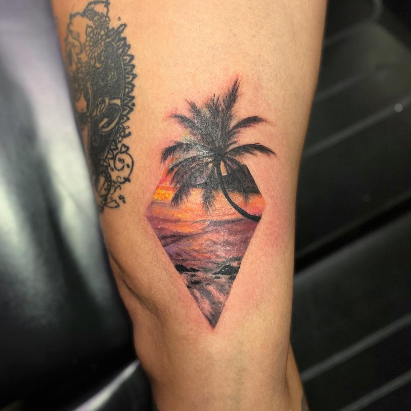 Sunset palm tree realism tattoo on the forearm by Sela ✨Las Vegas Tattoo Artist