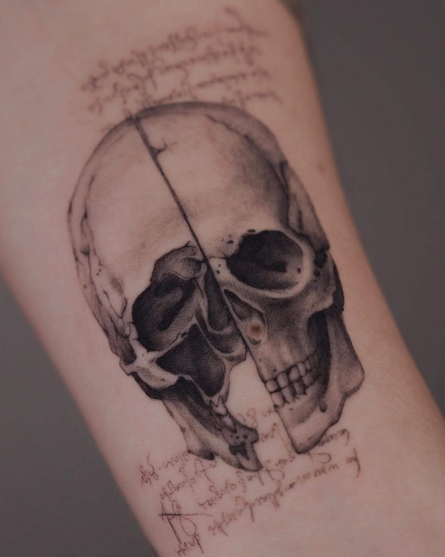 Skull realism tattoo on the forearm by Tattoo Artist
