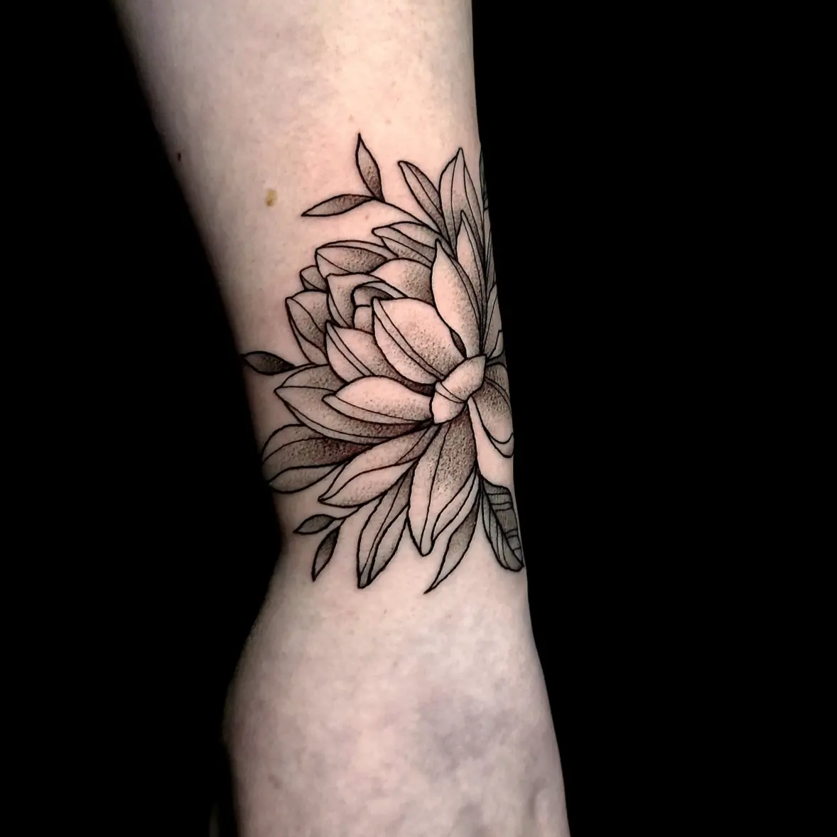 Flower dotwork tattoo on the forearm by Sydney Paige, Mentor, Ohio
