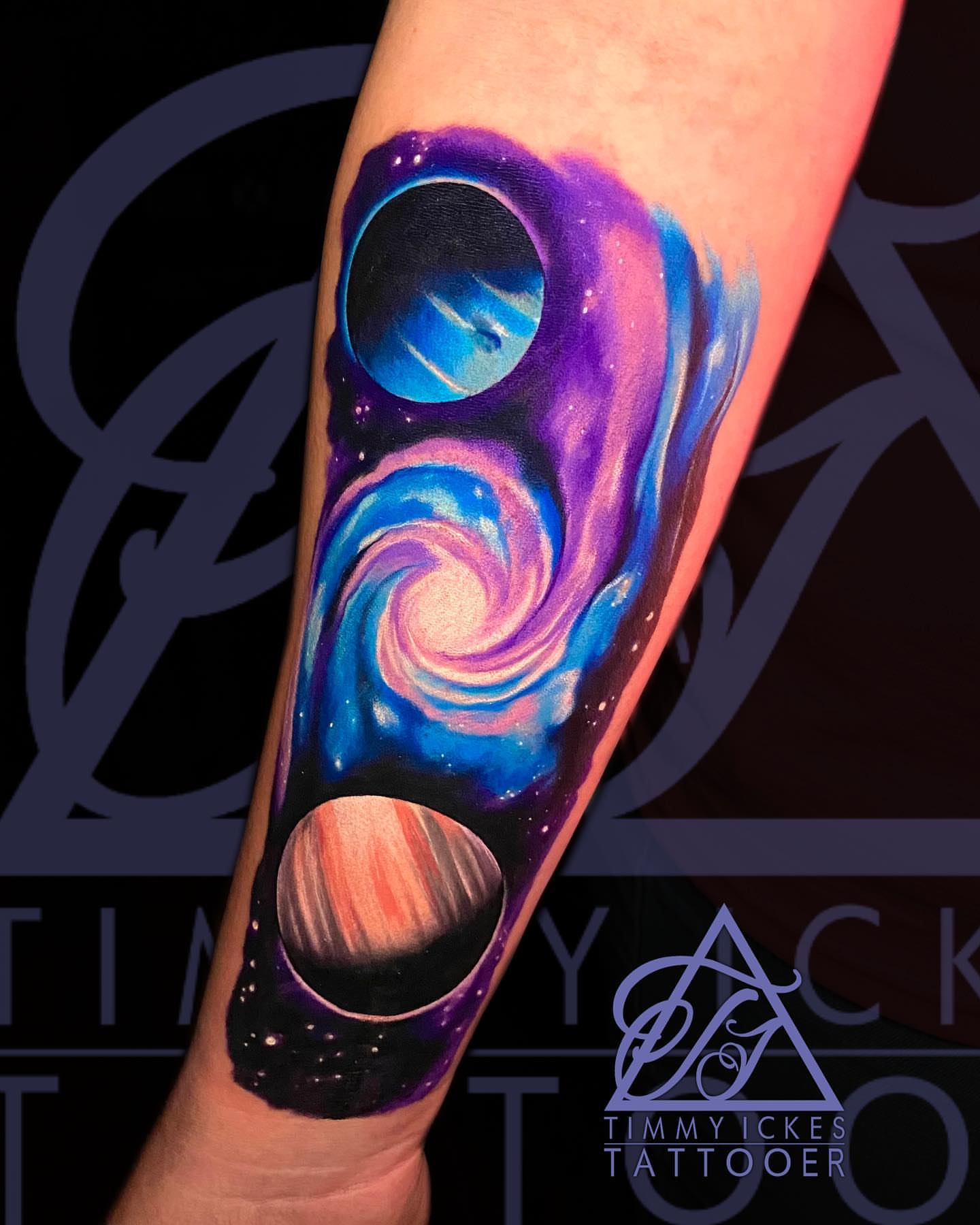 Galaxy realism tattoo on the forearm by Timmy Ickes