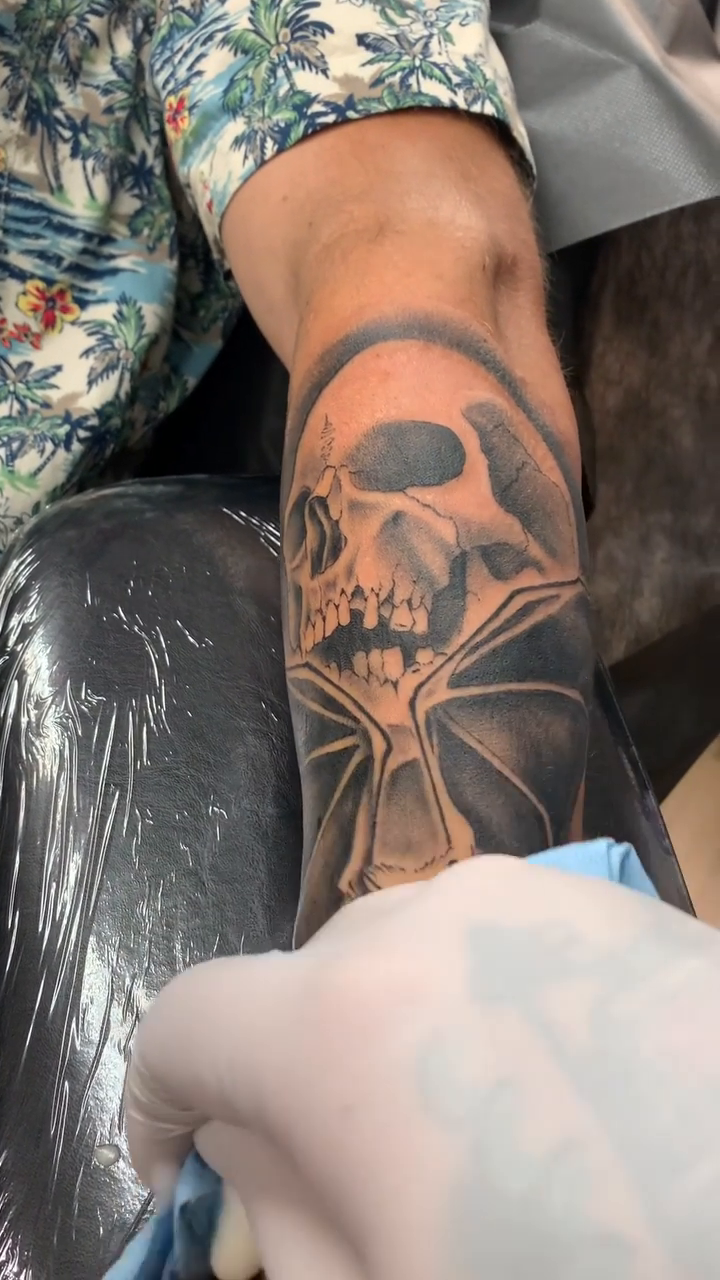 Skull and bat dark realism tattoo by Travis Thorpe