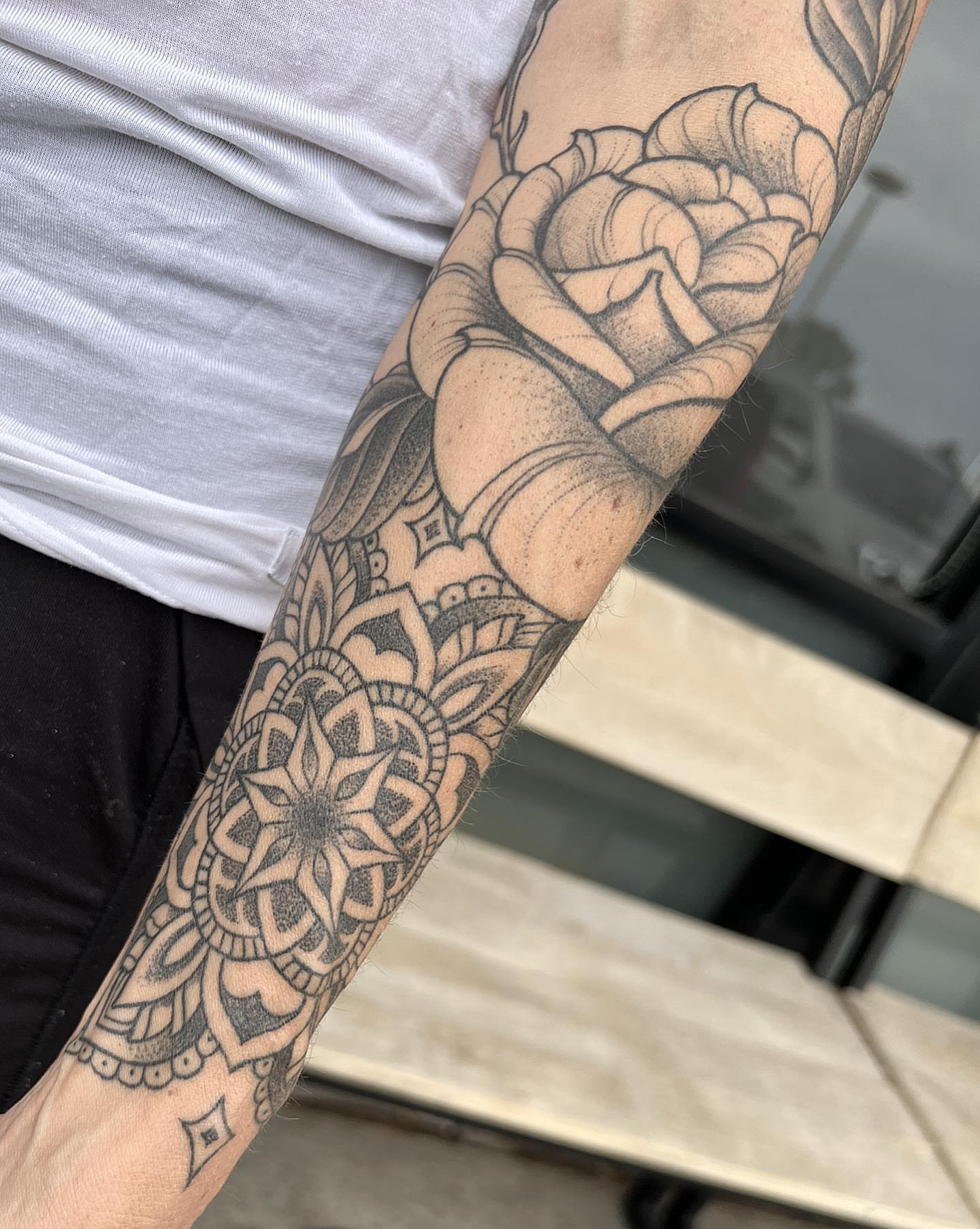 Rose geometric tattoo on the forearm by Byron Winkelman, Gilbert, Arizona