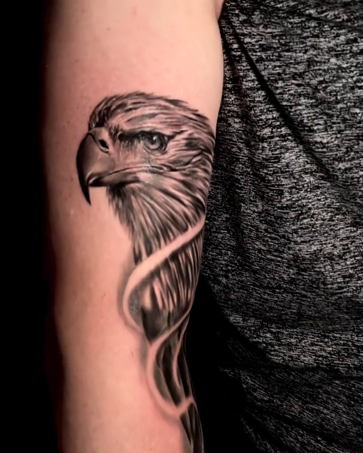 Eagle head and wing realism tattoo by Jacob Martin, Toledo, Ohio