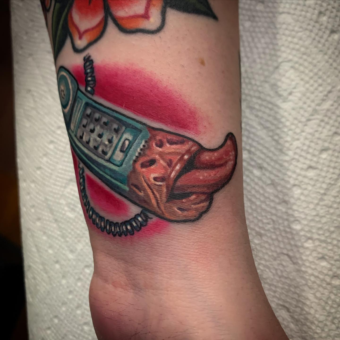 Radio and hot dog realism tattoo on the forearm by Izak Blanke, Murfreesboro, Tennessee
