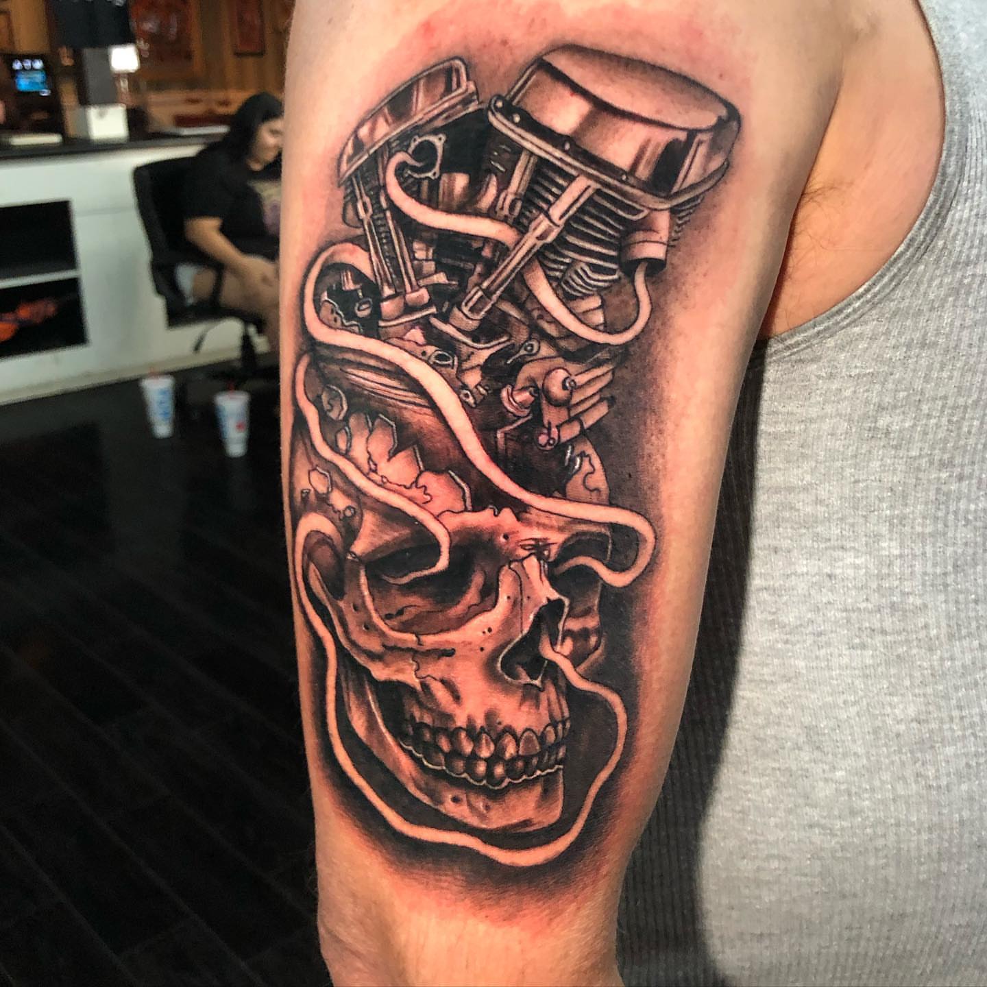 Mechanical skull realism tattoo on the forearm by Tattoos by Rey G.