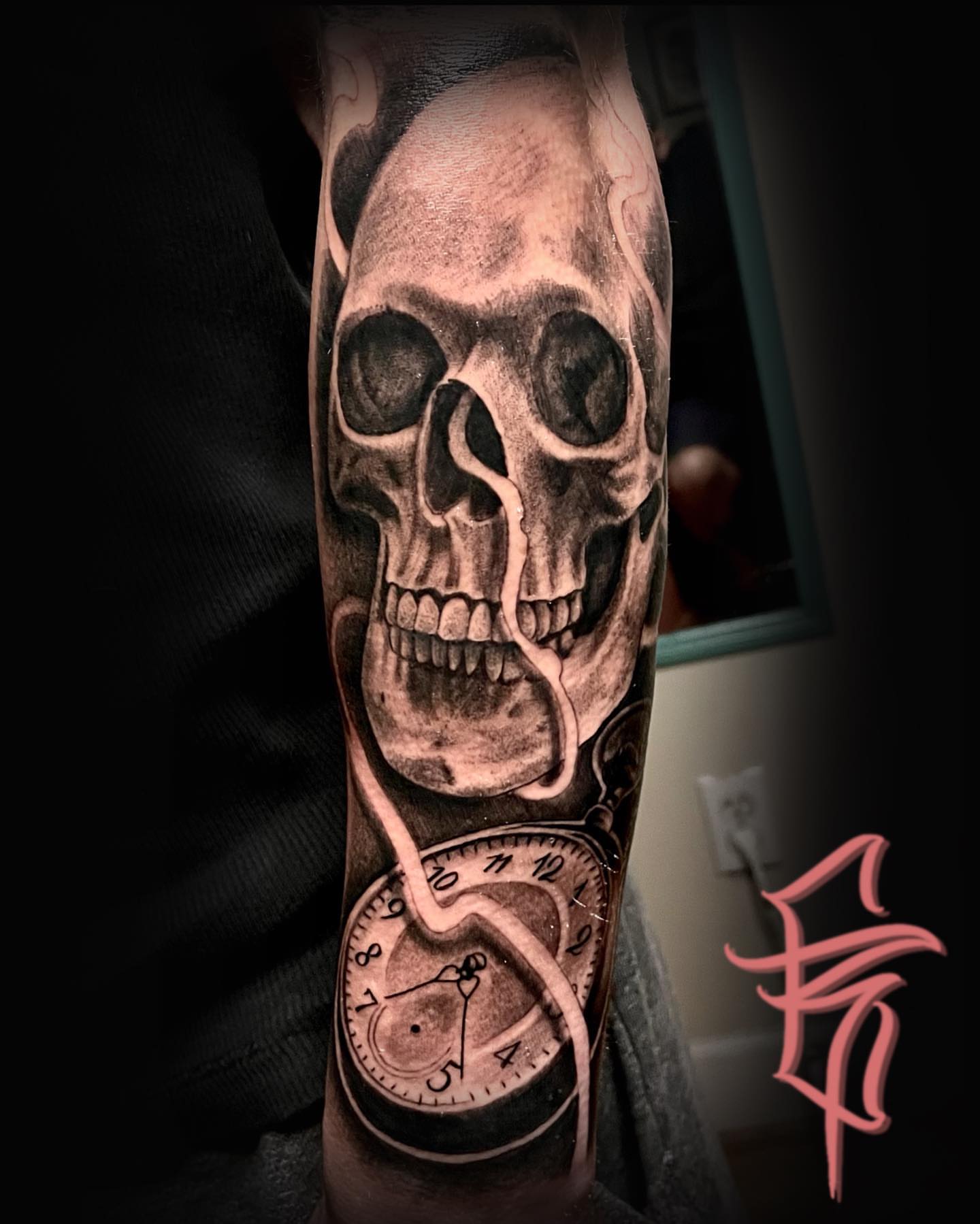 Skull and pocket watch realism tattoo on the forearm by Fullerton ca tattooing