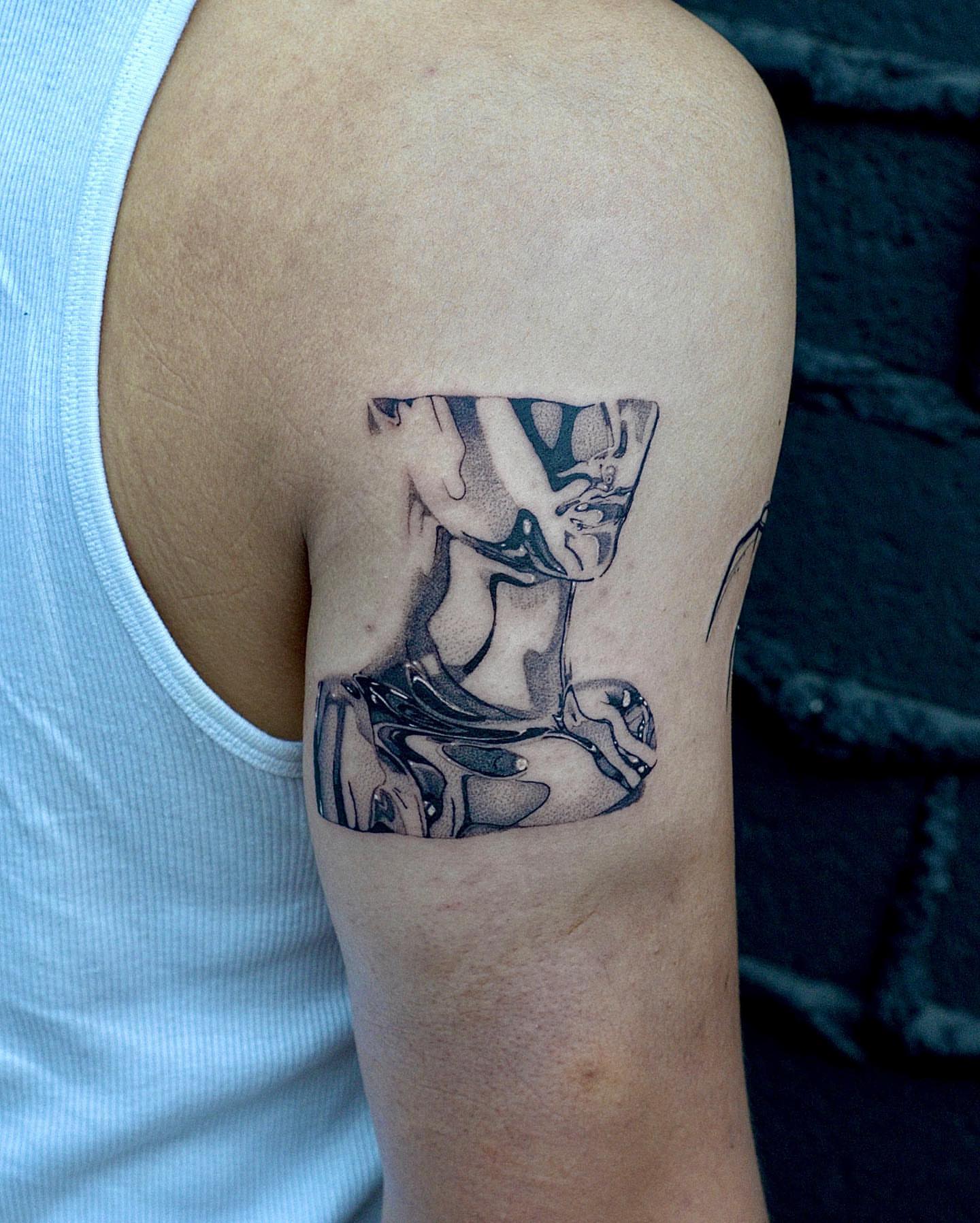 Abstract figure black and grey tattoo on the forearm by Fine line tattoo San Diego, San Diego, California
