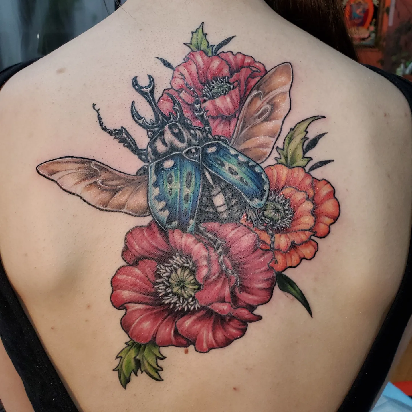 Tattoo by @erinrietzetattoo — realism, dotwork