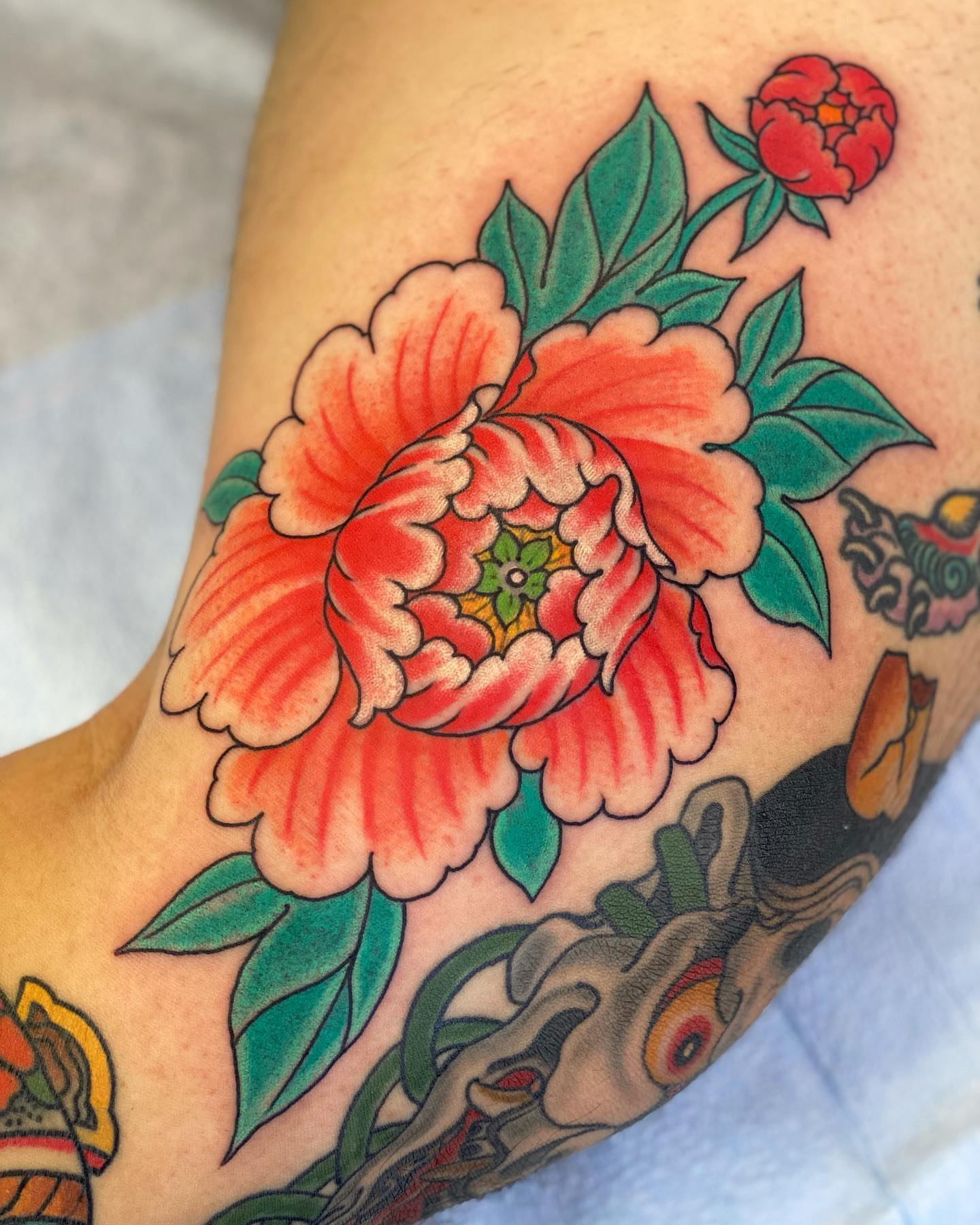 Peony American traditional tattoo on the forearm by B e A U B R A D y, Costa Mesa, California
