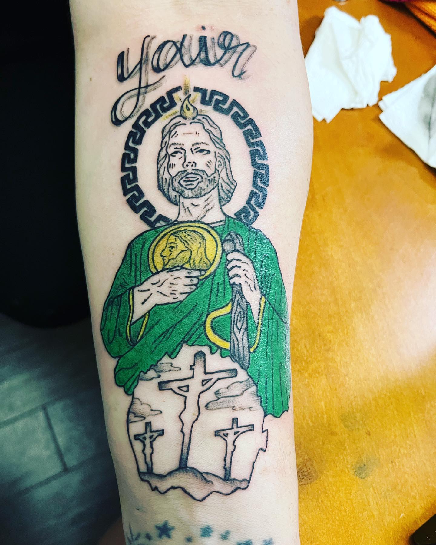 Religious figure American traditional tattoo on the forearm by Anna DeLuna