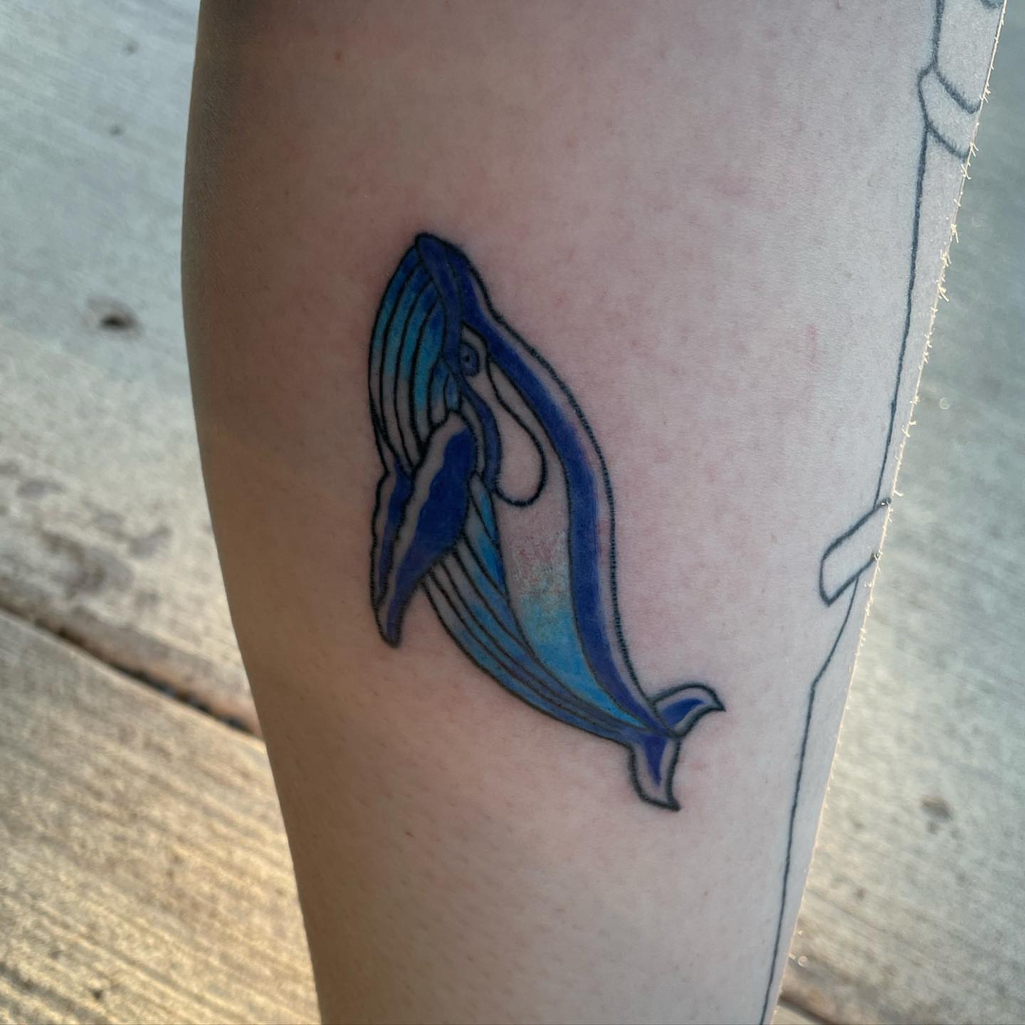 Whale geometric tattoo on the forearm by Anna sabrowsky