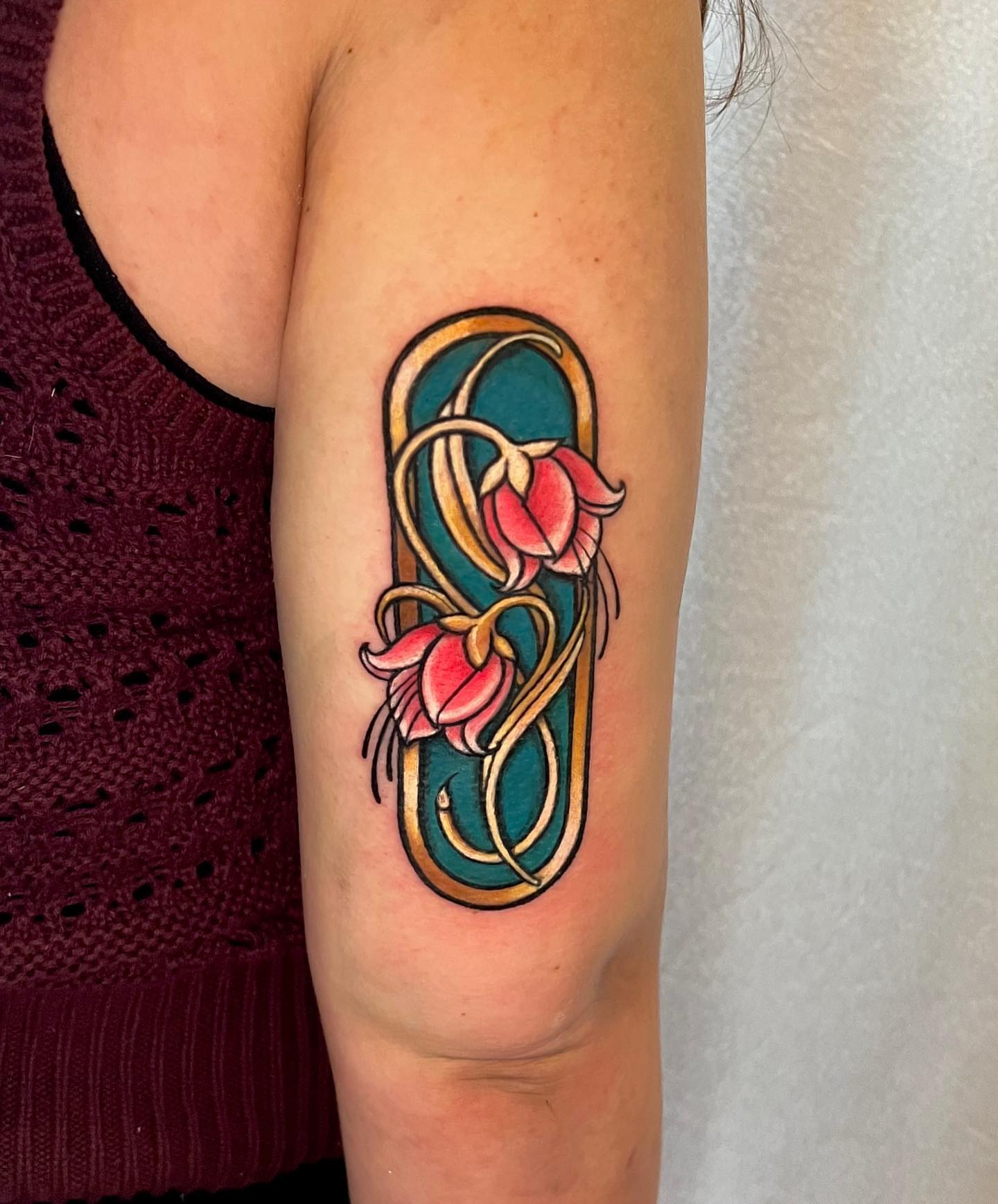 Floral design new school tattoo on the forearm by Cortney Norton
