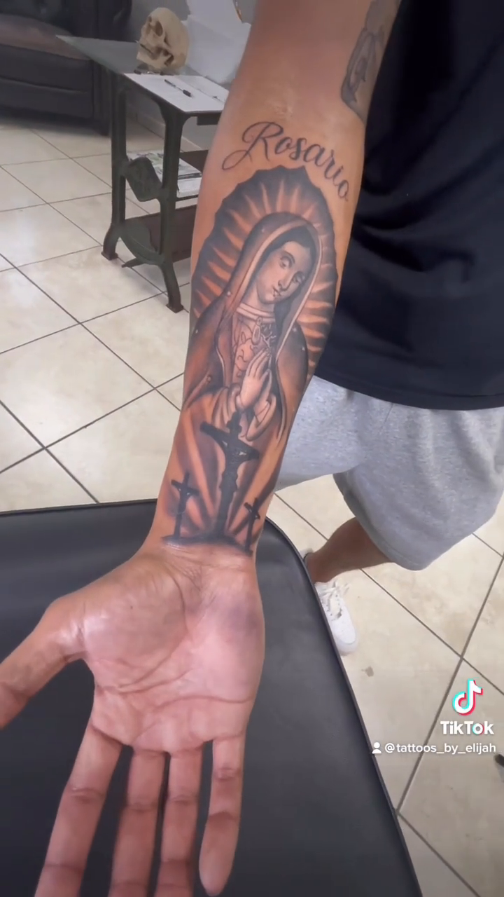Virgin Mary with crucifix Chicano tattoo by @tattoos_by_elijah