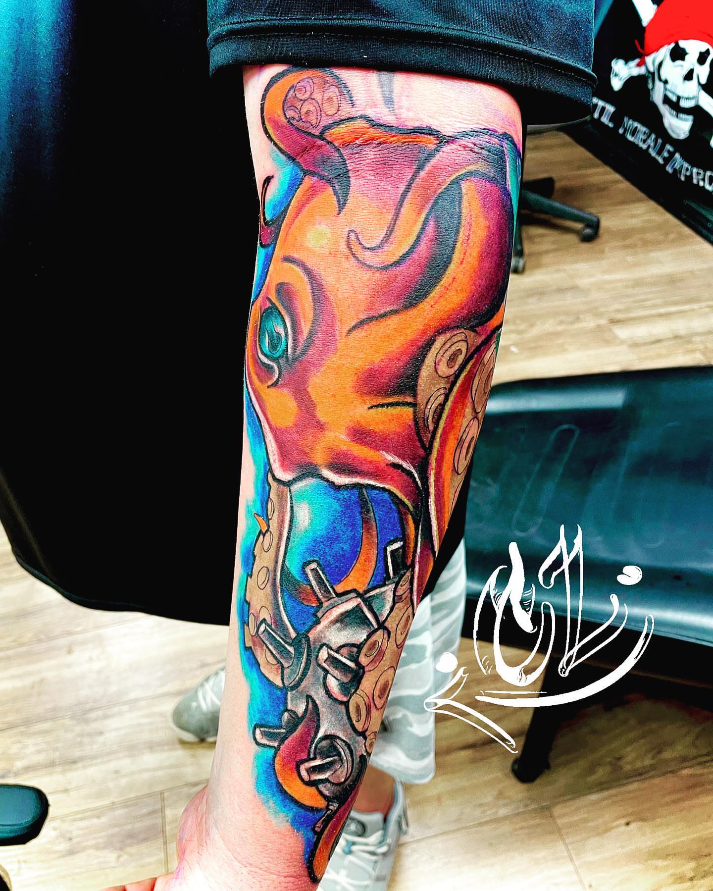 Octopus geometric tattoo on the forearm by Labbé