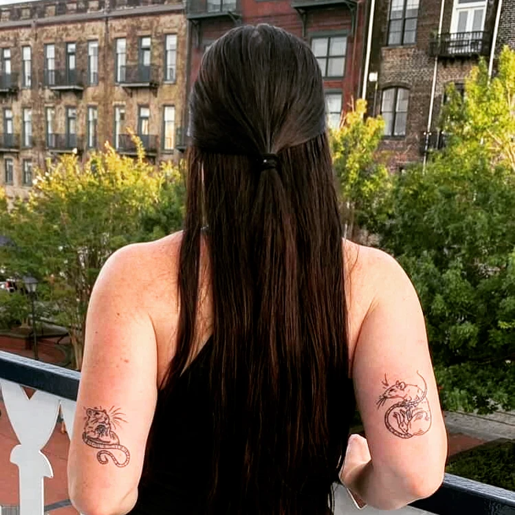 Cat and snake American traditional tattoo on the upper arm by Nadine ☥